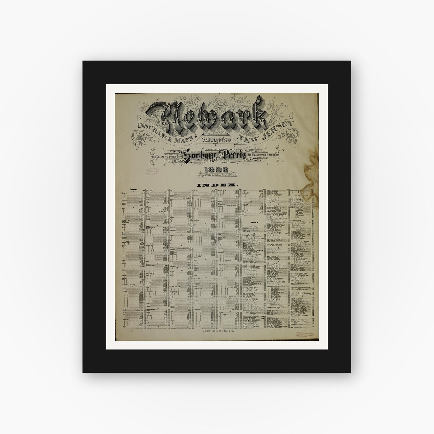 Old map wall art mockup — black gallery frame with white mat — Sanborn Fire Insurance Map from Newark, Essex County, New Jersey (1892), Sheet #0001