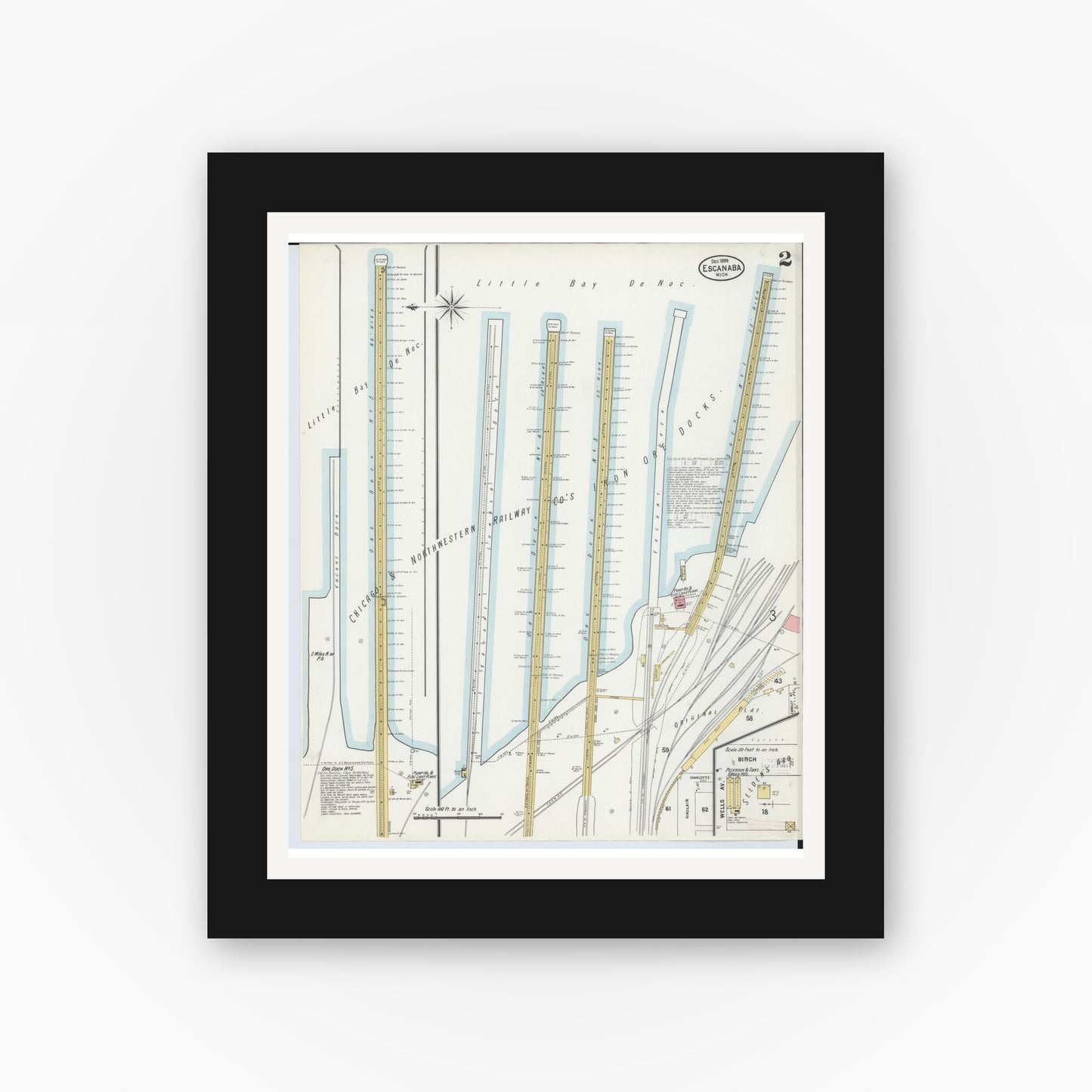 Old map wall art mockup — black gallery frame with white mat — Sanborn Fire Insurance Map from Escanaba, Delta County, Michigan (1899), Sheet #0002