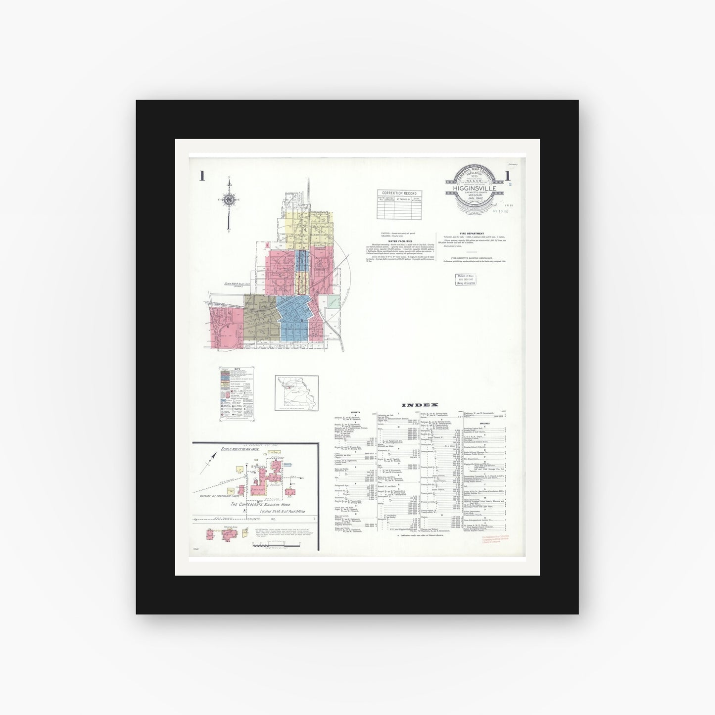 Old map wall art mockup — black gallery frame with white mat — Sanborn Fire Insurance Map from Higginsville, Lafayette County, Missouri (1942) - Complete Map Set