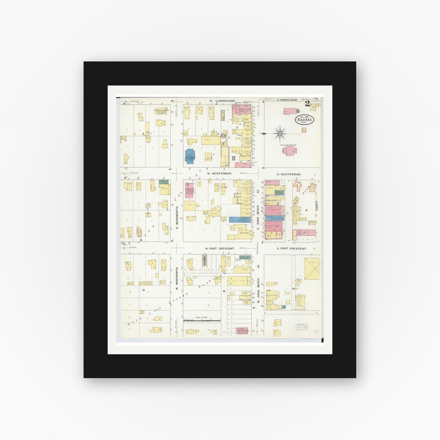 Old map wall art mockup — black gallery frame with white mat — Sanborn Fire Insurance Map from Bad Axe, Huron County, Michigan (1909), Sheet #0002