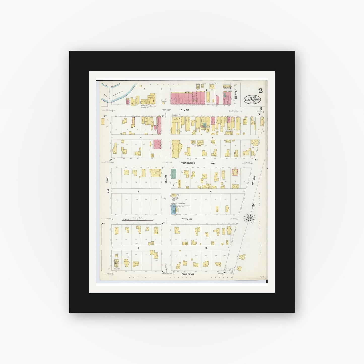 Old map wall art mockup — black gallery frame with white mat — Sanborn Fire Insurance Map from Elk Rapids, Antrim County, Michigan (1907), Sheet #0002