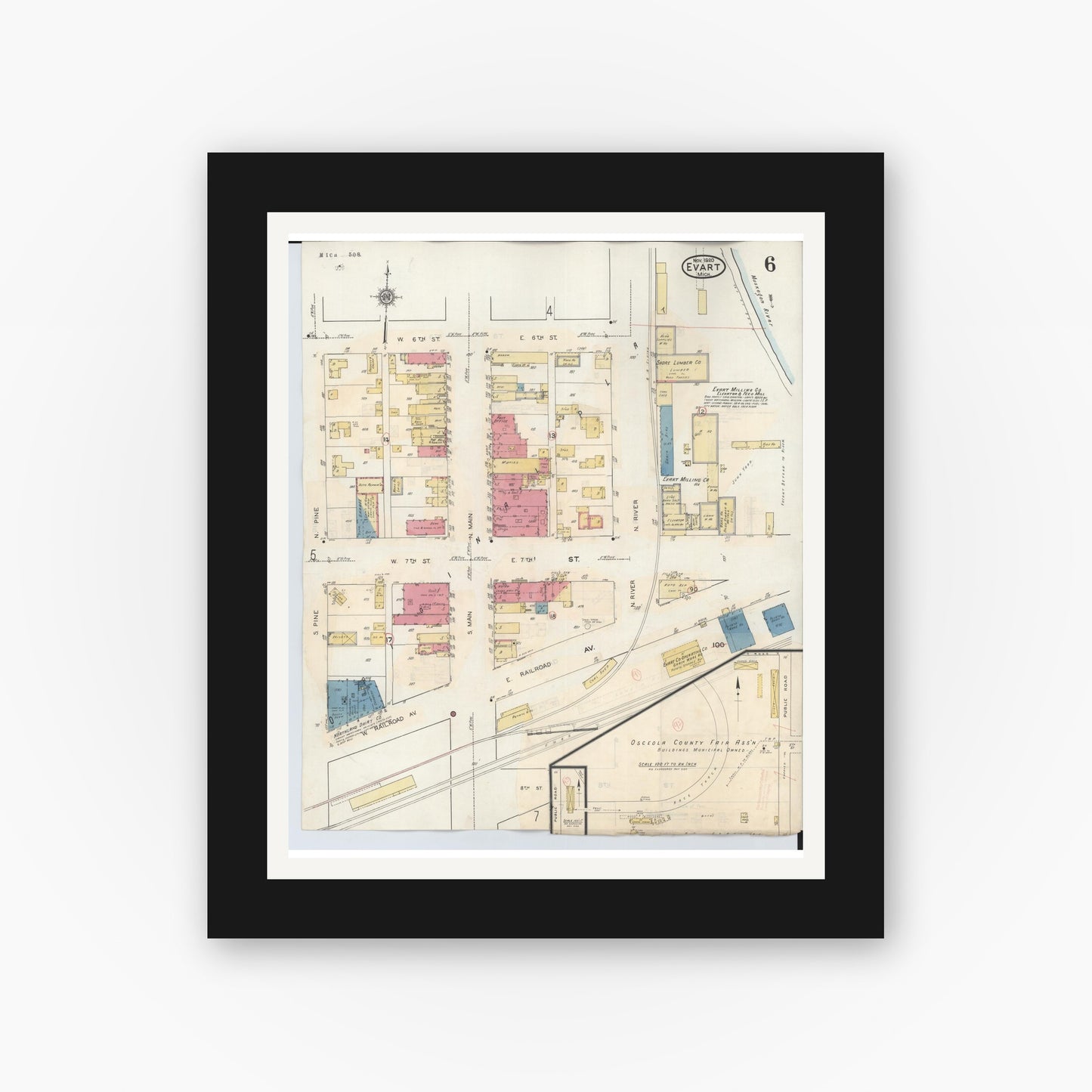 Old map wall art mockup — black gallery frame with white mat — Sanborn Fire Insurance Map from Evart, Osceola County, Michigan (1942), Sheet #0006