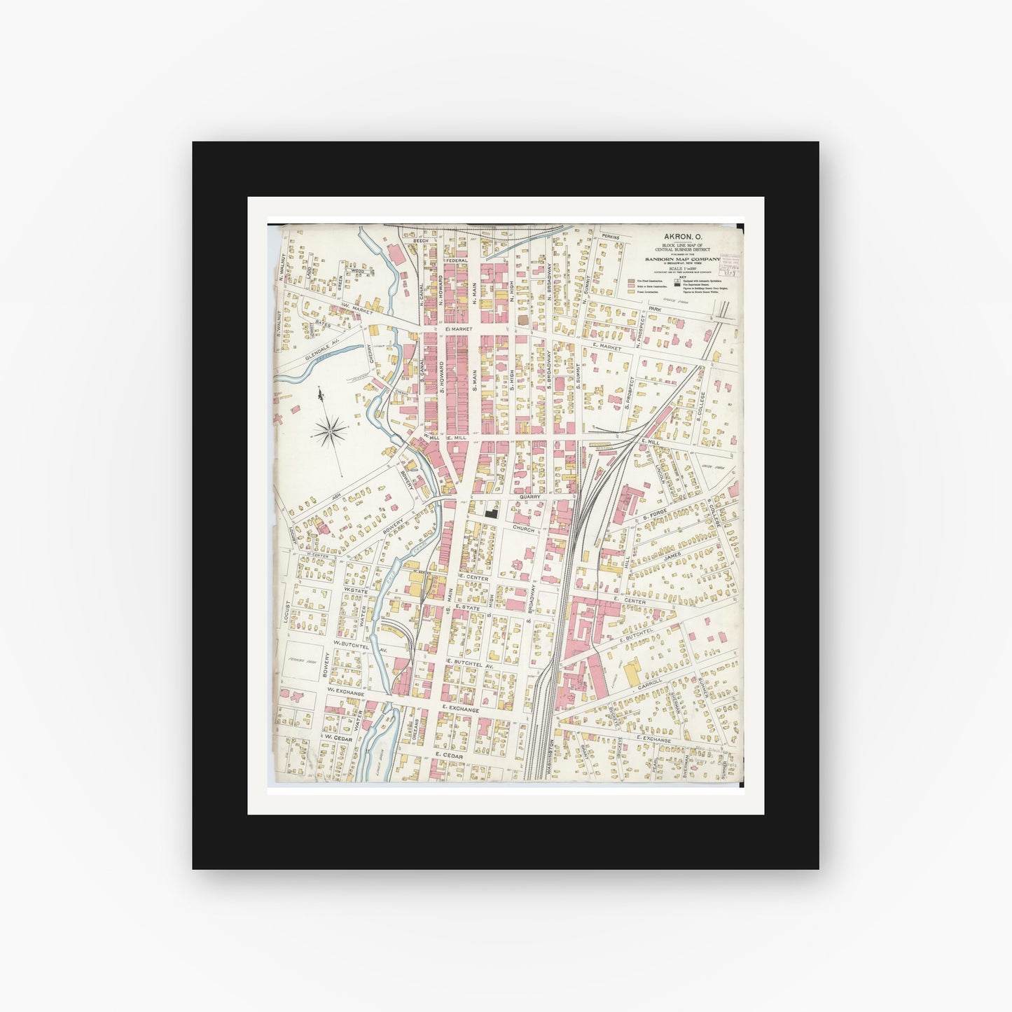 Old map wall art mockup — black gallery frame with white mat — Sanborn Fire Insurance Map from Akron, Summit County, Ohio (1906), Sheet #0001