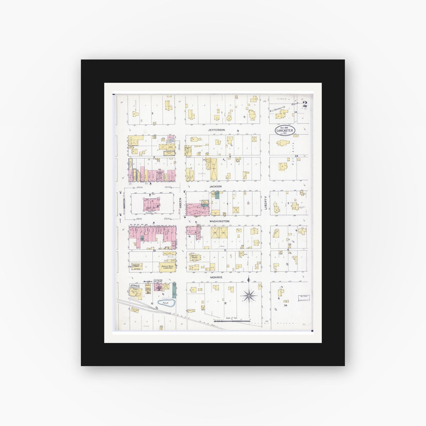 Old map wall art mockup — black gallery frame with white mat — Sanborn Fire Insurance Map from Lancaster, Schuyler County, Missouri (1909), Sheet #0002