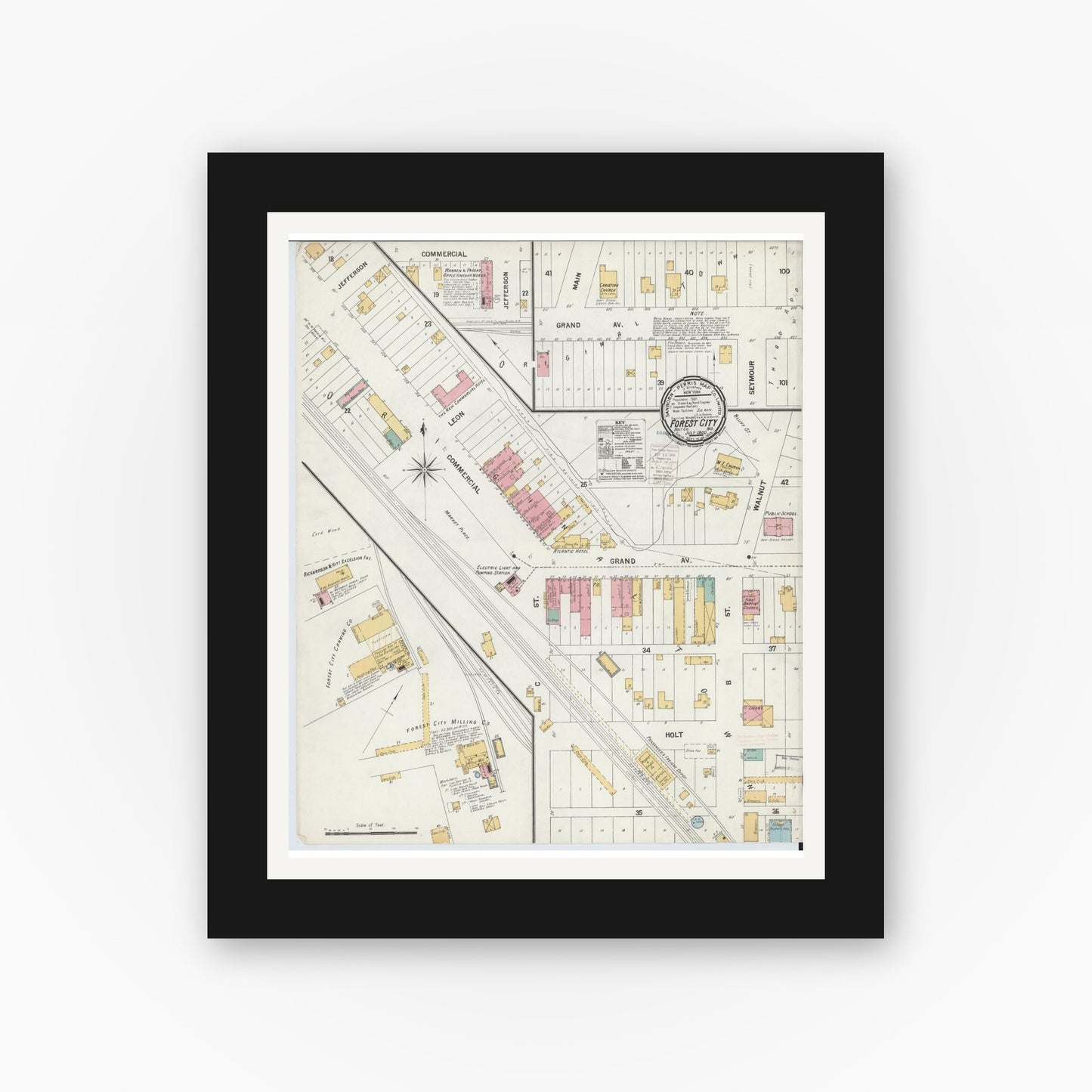 Old map wall art mockup — black gallery frame with white mat — Sanborn Fire Insurance Map from Forest City, Holt County, Missouri (1900), Sheet #0001