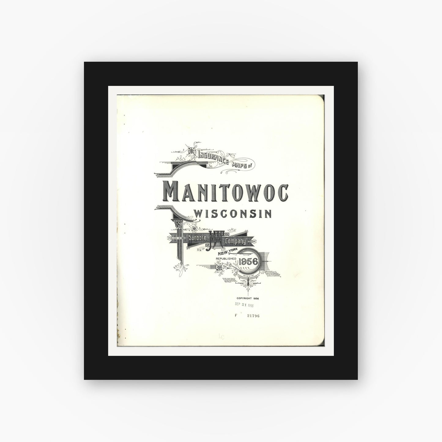 Old map wall art mockup — black gallery frame with white mat — Sanborn Fire Insurance Map from Manitowoc, Manitowoc County, Wisconsin (1956), Sheet #0001