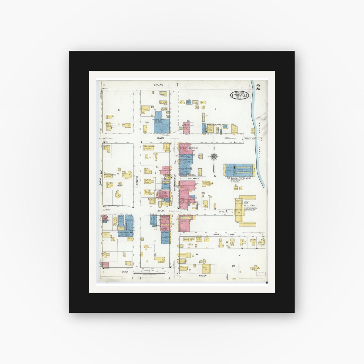 Old map wall art mockup — black gallery frame with white mat — Sanborn Fire Insurance Map from Titusville, Brevard County, Florida (1920), Sheet #0002