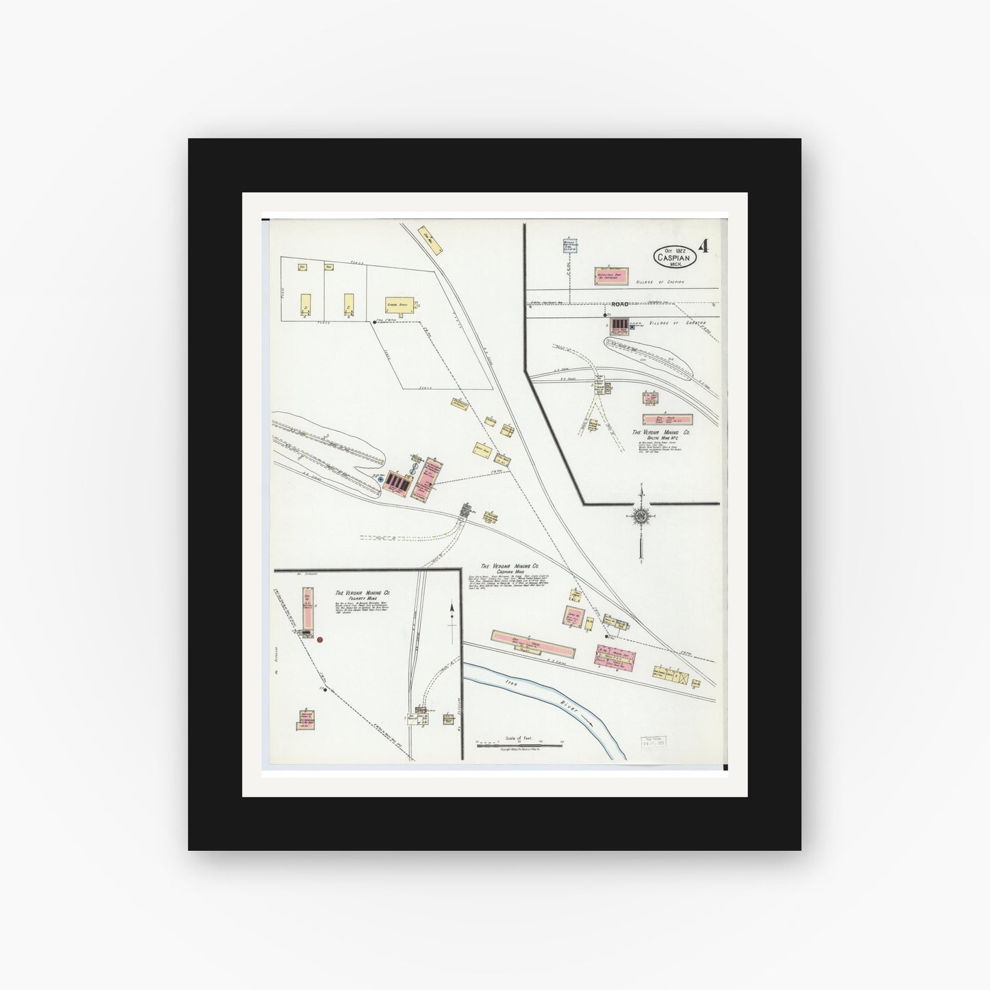 Old map wall art mockup — black gallery frame with white mat — Sanborn Fire Insurance Map from Caspian, Iron County, Michigan (1922), Sheet #0004