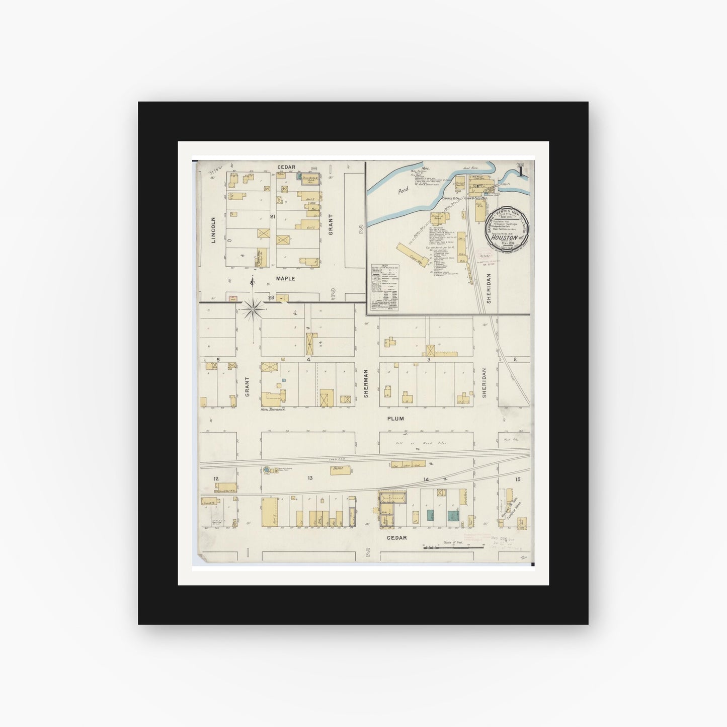 Old map wall art mockup — black gallery frame with white mat — Sanborn Fire Insurance Map from Houston, Houston County, Minnesota (1894), Sheet #0001