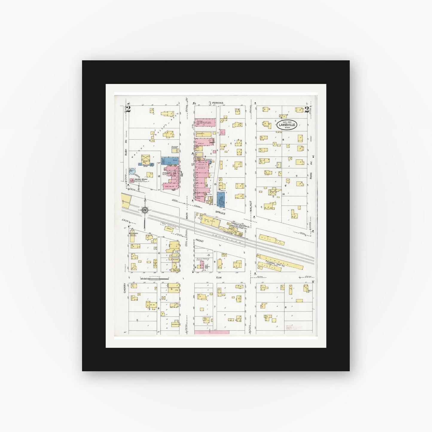 Old map wall art mockup — black gallery frame with white mat — Sanborn Fire Insurance Map from Lakeville, Dakota County, Minnesota (1930), Sheet #0002