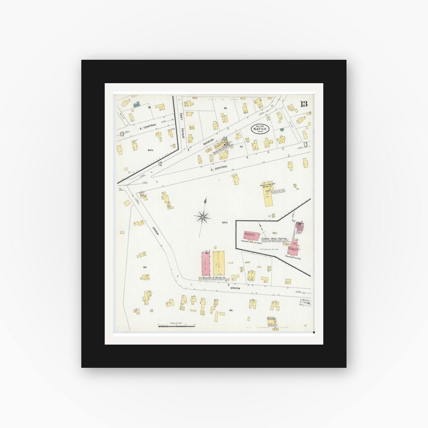 Old map wall art mockup — black gallery frame with white mat — Sanborn Fire Insurance Map from Natick, Middlesex County, Massachusetts (1909), Sheet #0013