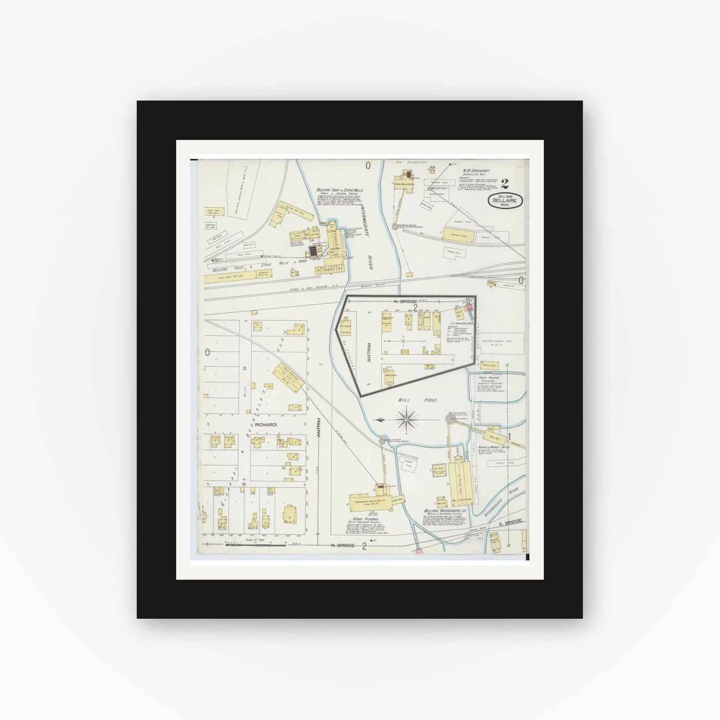 Old map wall art mockup — black gallery frame with white mat — Sanborn Fire Insurance Map from Bellaire, Antrim County, Michigan (1898), Sheet #0002
