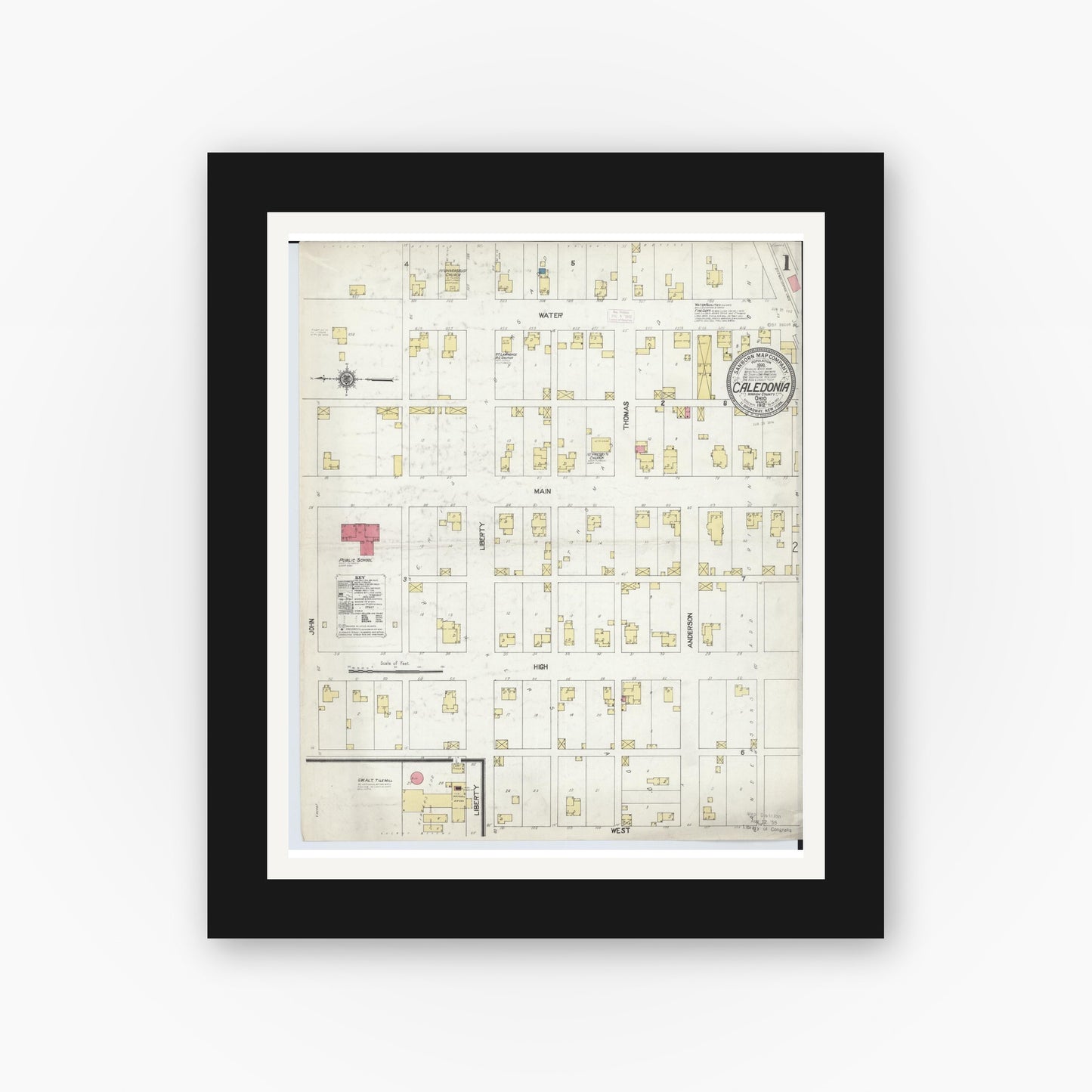 Old map wall art mockup — black gallery frame with white mat — Sanborn Fire Insurance Map from Caledonia, Marion County, Ohio (1912), Sheet #0001