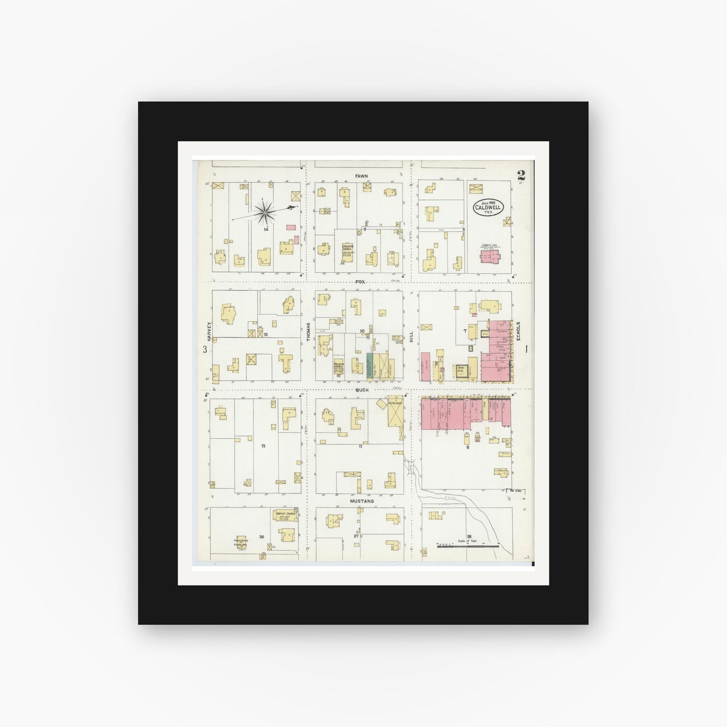 Old map wall art mockup — black gallery frame with white mat — Sanborn Fire Insurance Map from Caldwell, Burleson County, Texas (1906), Sheet #0002