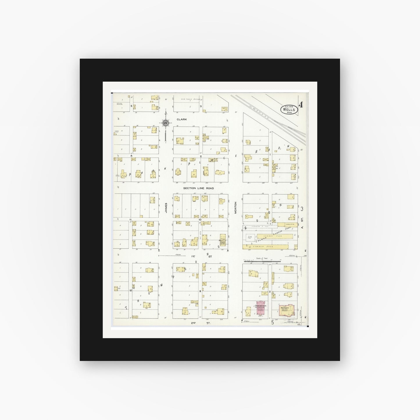 Old map wall art mockup — black gallery frame with white mat — Sanborn Fire Insurance Map from Wells, Faribault County, Minnesota (1909), Sheet #0004