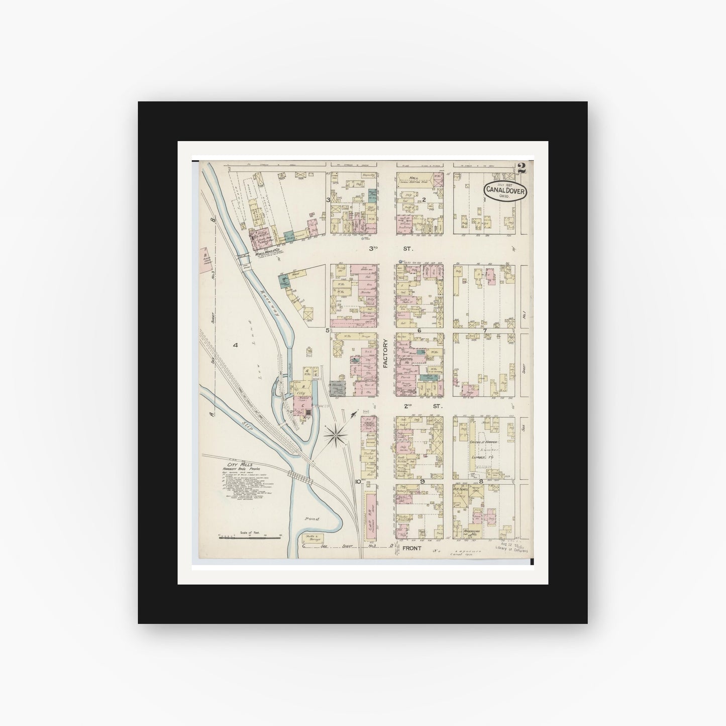 Old map wall art mockup — black gallery frame with white mat — Sanborn Fire Insurance Map from Canal Dover, Tuscarawas County, Ohio (1887), Sheet #0002