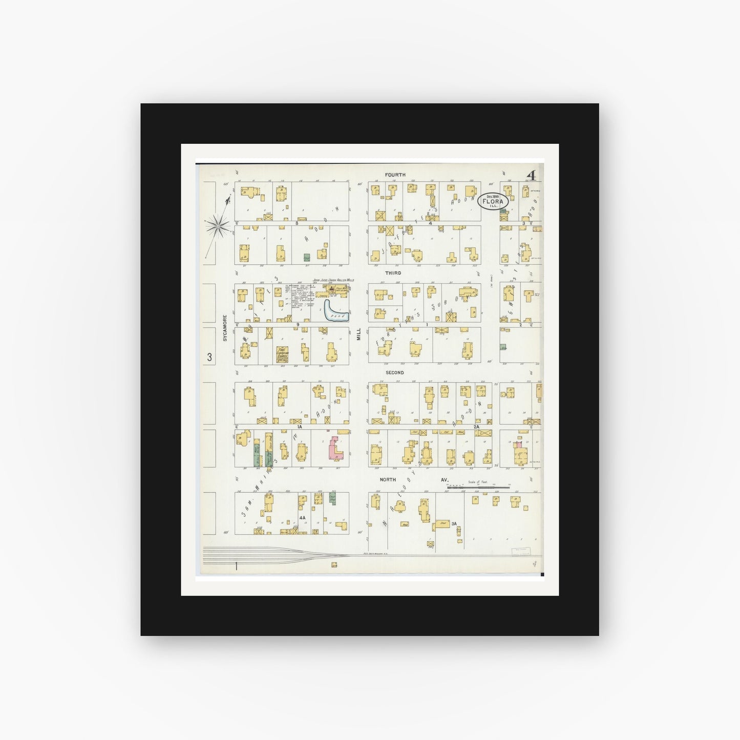 Old map wall art mockup — black gallery frame with white mat — Sanborn Fire Insurance Map from Flora, Clay County, Illinois (1899), Sheet #0004