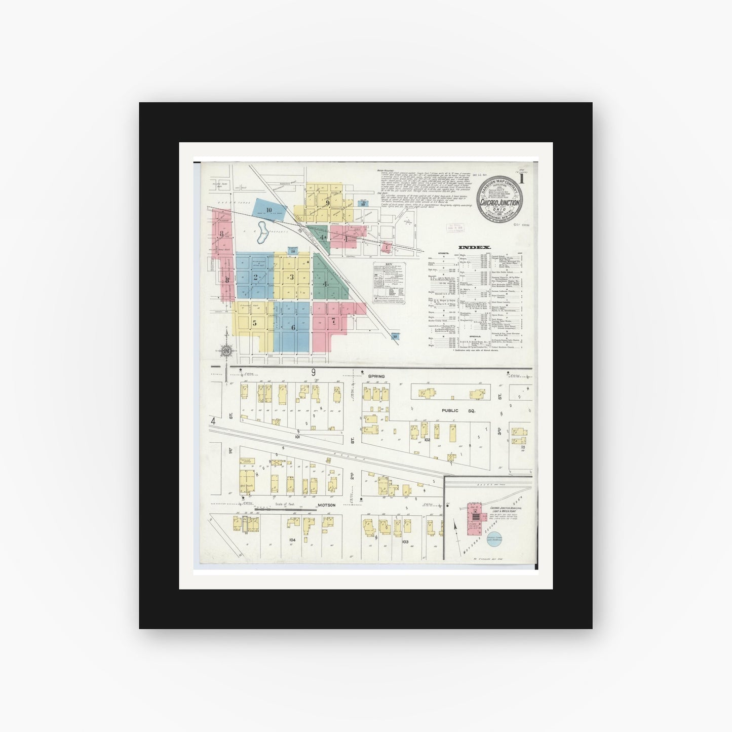 Old map wall art mockup — black gallery frame with white mat — Sanborn Fire Insurance Map from Chicago Junction, Huron County, Ohio (1911), Sheet #0001