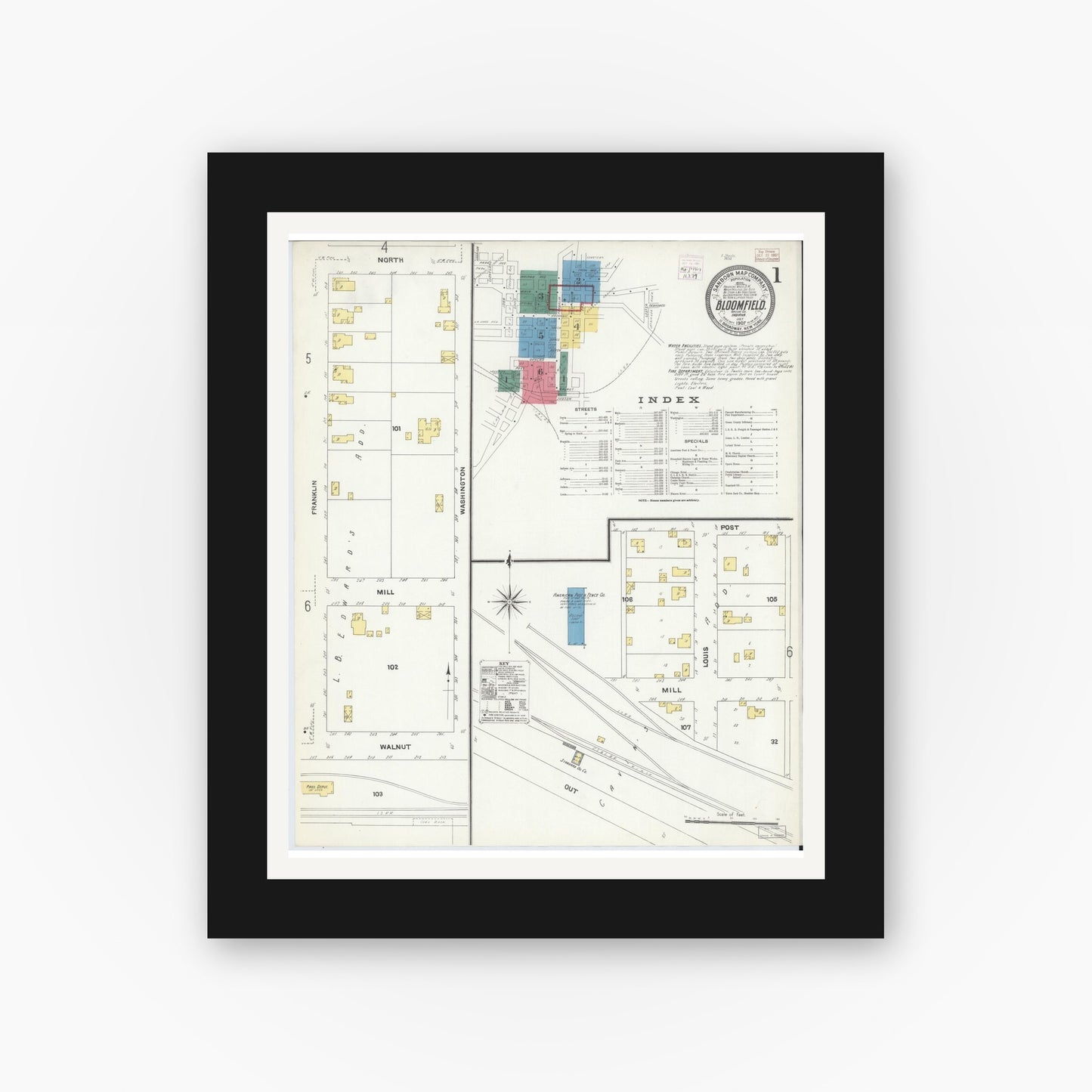 Old map wall art mockup — black gallery frame with white mat — Sanborn Fire Insurance Map from Bloomfield, Greene County, Indiana (1907), Sheet #0001