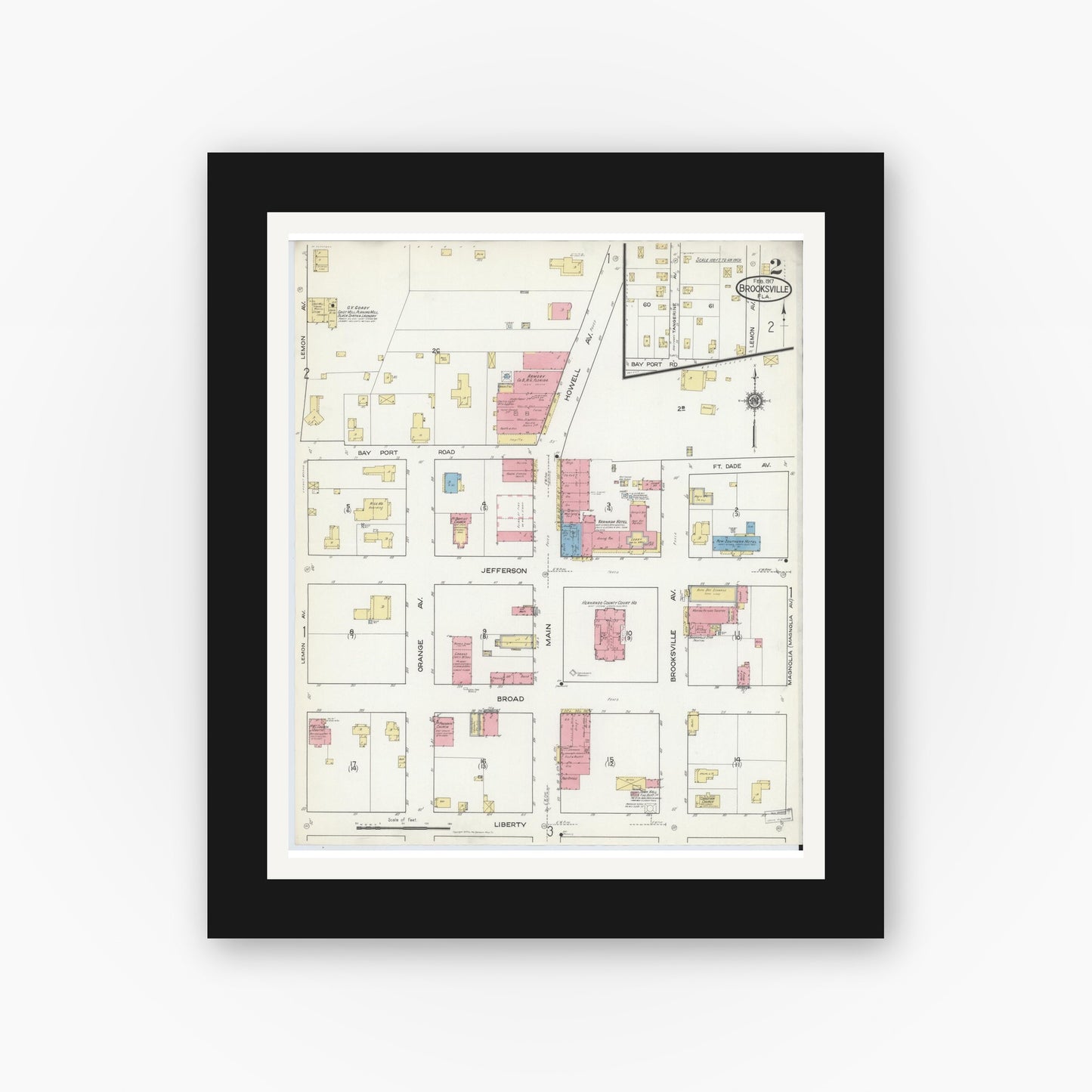 Old map wall art mockup — black gallery frame with white mat — Sanborn Fire Insurance Map from Brooksville, Hernando County, Florida (1917), Sheet #0002