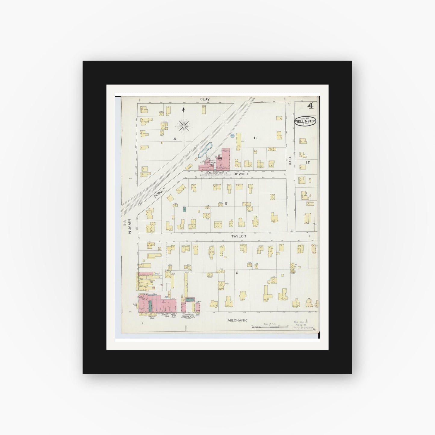 Old map wall art mockup — black gallery frame with white mat — Sanborn Fire Insurance Map from Wellington, Lorain County, Ohio (1893), Sheet #0004