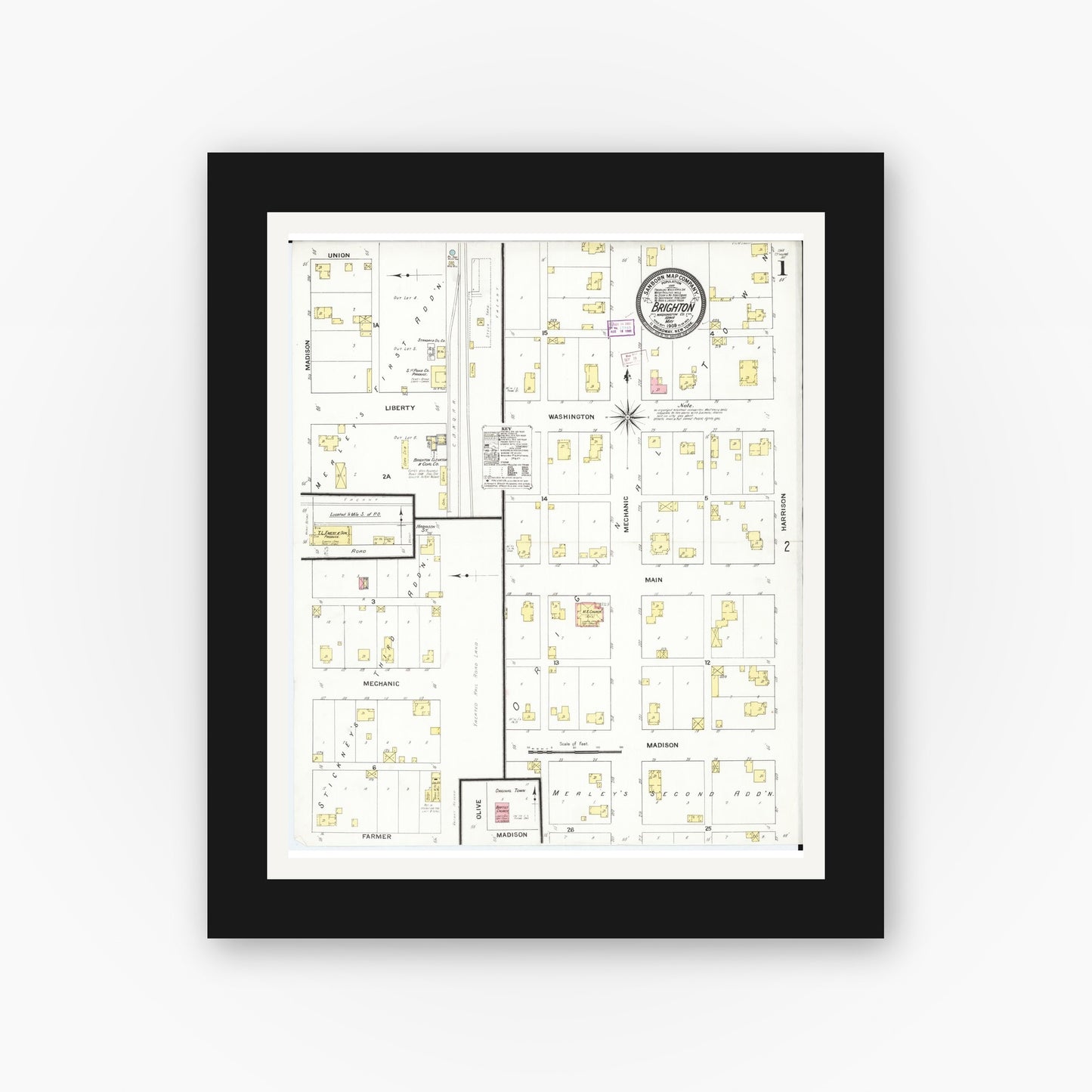 Old map wall art mockup — black gallery frame with white mat — Sanborn Fire Insurance Map from Brighton, Washington County, Iowa (1909) — Complete Set