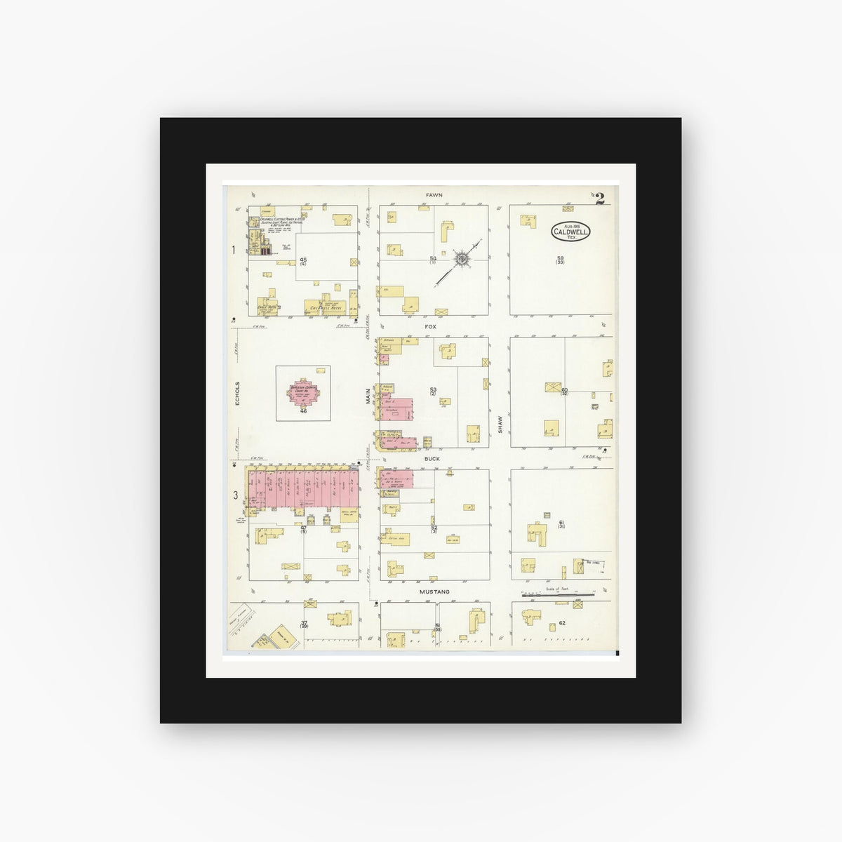 Old map wall art mockup — black gallery frame with white mat — Sanborn Fire Insurance Map from Caldwell, Burleson County, Texas (1915), Sheet #0002