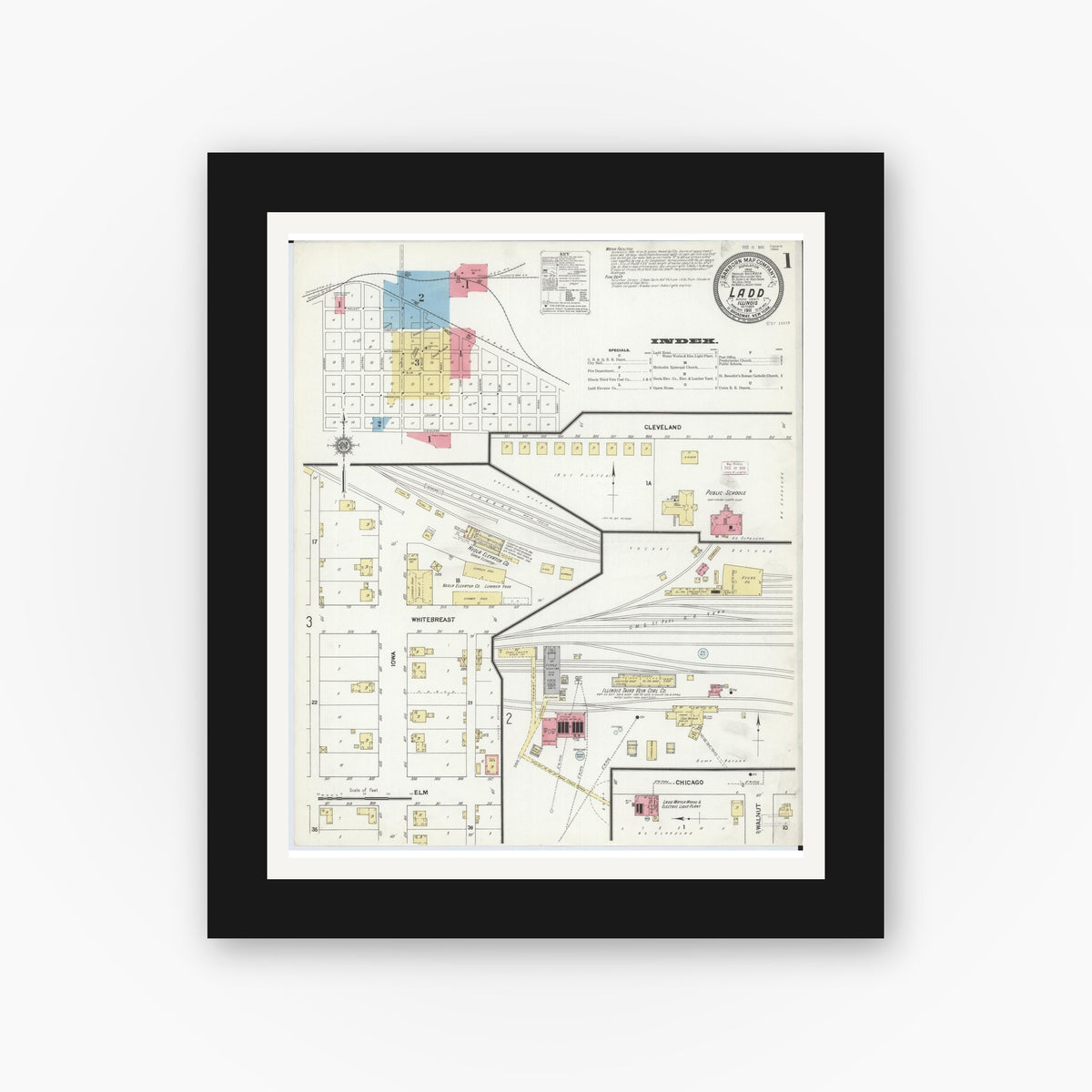 Old map wall art mockup — black gallery frame with white mat — Sanborn Fire Insurance Map from Ladd, Bureau County, Illinois (1911), Sheet #0001