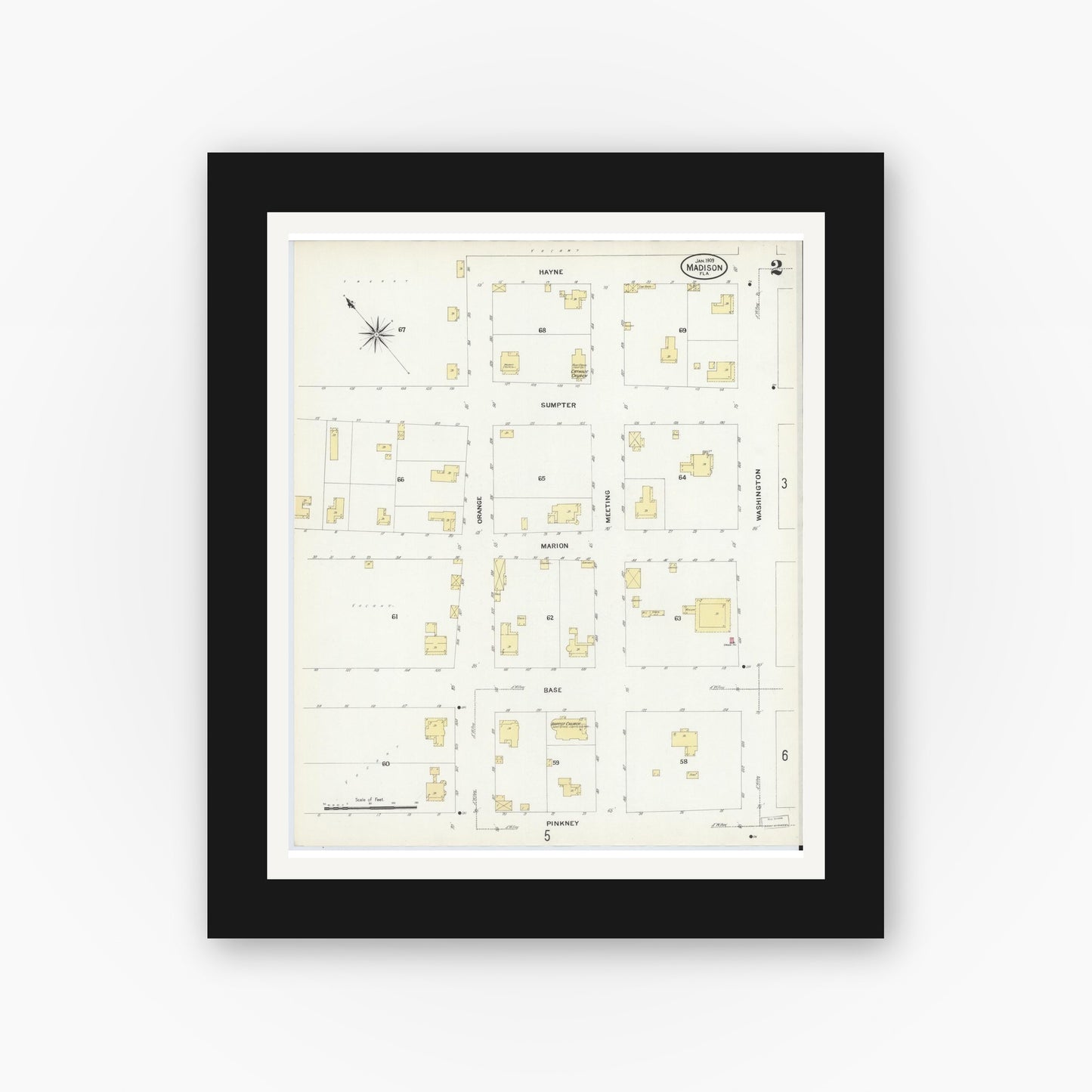 Old map wall art mockup — black gallery frame with white mat — Sanborn Fire Insurance Map from Madison, Madison County, Florida (1909), Sheet #0002
