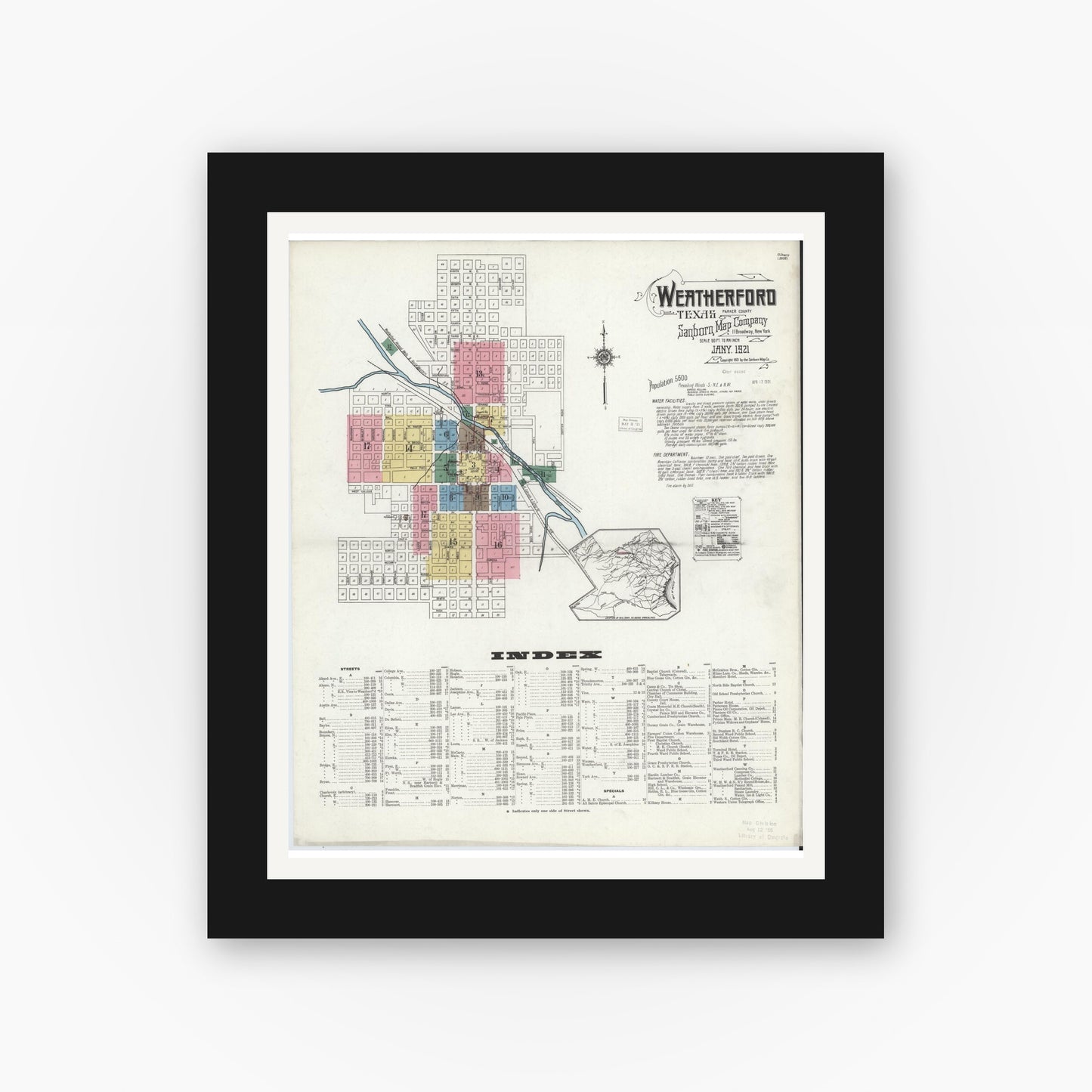 Old map wall art mockup — black gallery frame with white mat — Sanborn Fire Insurance Map from Weatherford, Parker County, Texas (1921), Sheet #0001