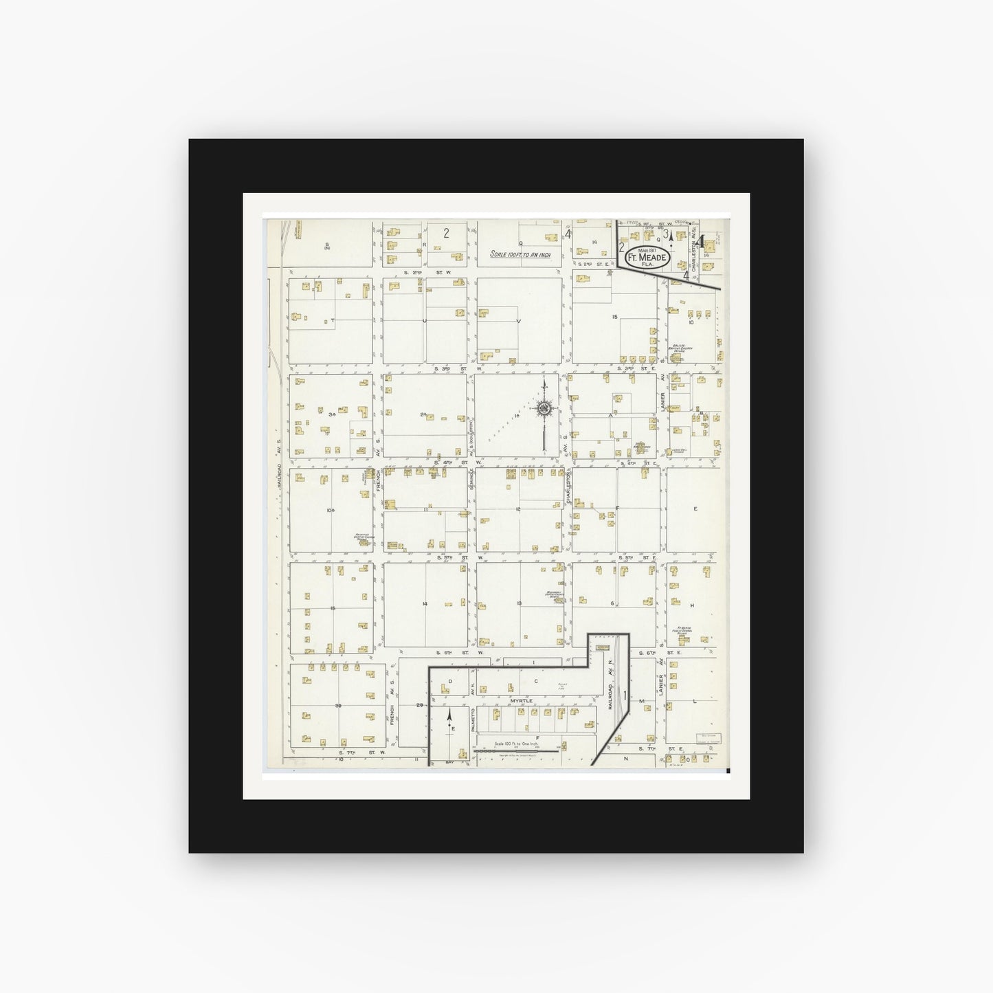 Old map wall art mockup — black gallery frame with white mat — Sanborn Fire Insurance Map from Fort Meade, Polk County, Florida (1917), Sheet #0004