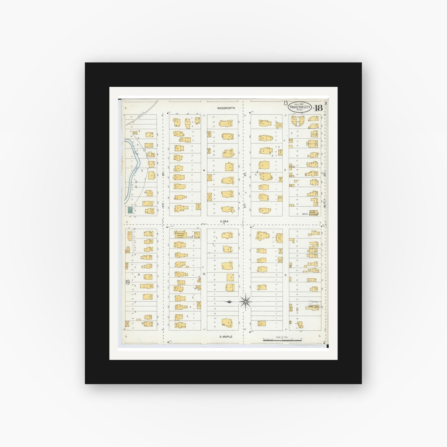 Old map wall art mockup — black gallery frame with white mat — Sanborn Fire Insurance Map from Traverse City, Grand Traverse County, Michigan (1904), Sheet #0018