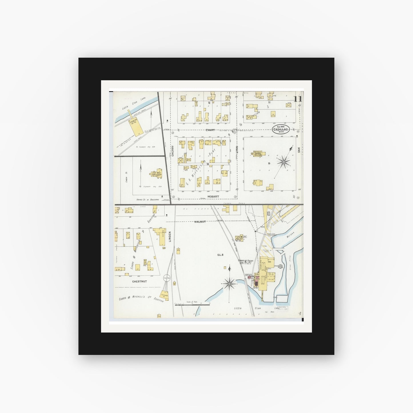 Old map wall art mockup — black gallery frame with white mat — Sanborn Fire Insurance Map from Cadillac, Wexford County, Michigan (1900), Sheet #0011