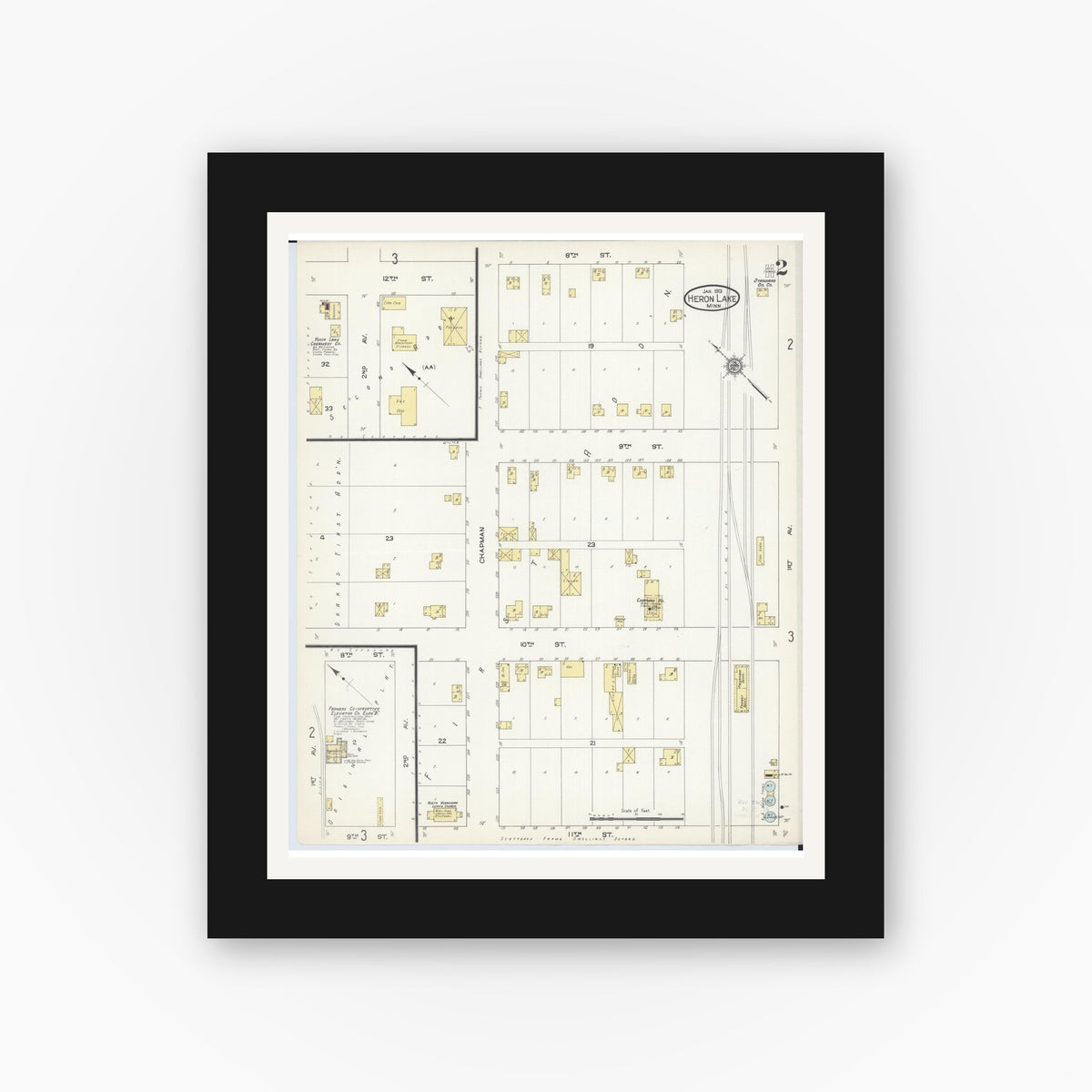 Old map wall art mockup — black gallery frame with white mat — Sanborn Fire Insurance Map from Heron Lake, Jackson County, Minnesota (1913), Sheet #0002