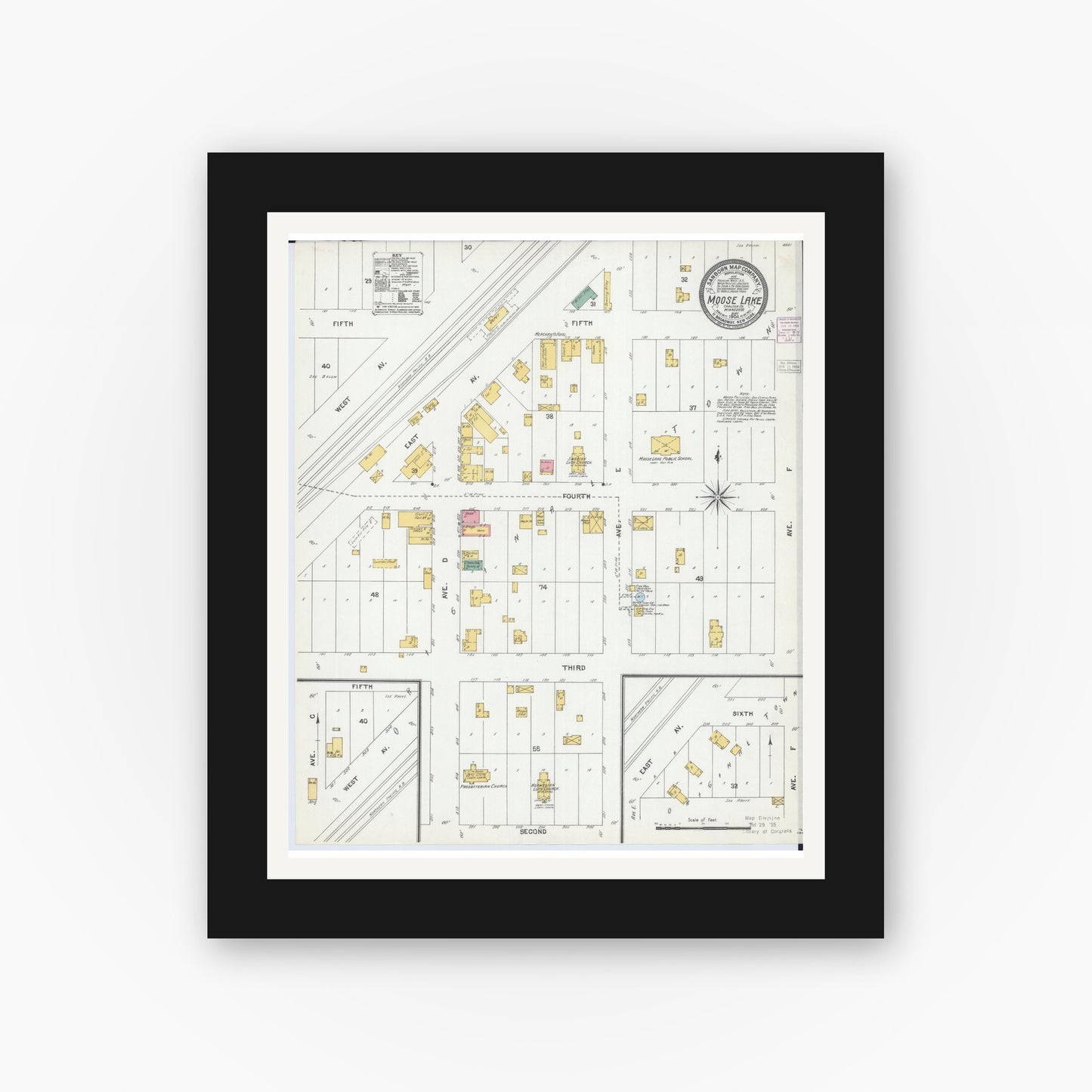 Old map wall art mockup — black gallery frame with white mat — Sanborn Fire Insurance Map from Moose Lake, Carlton County, Minnesota (1904), Sheet #0001