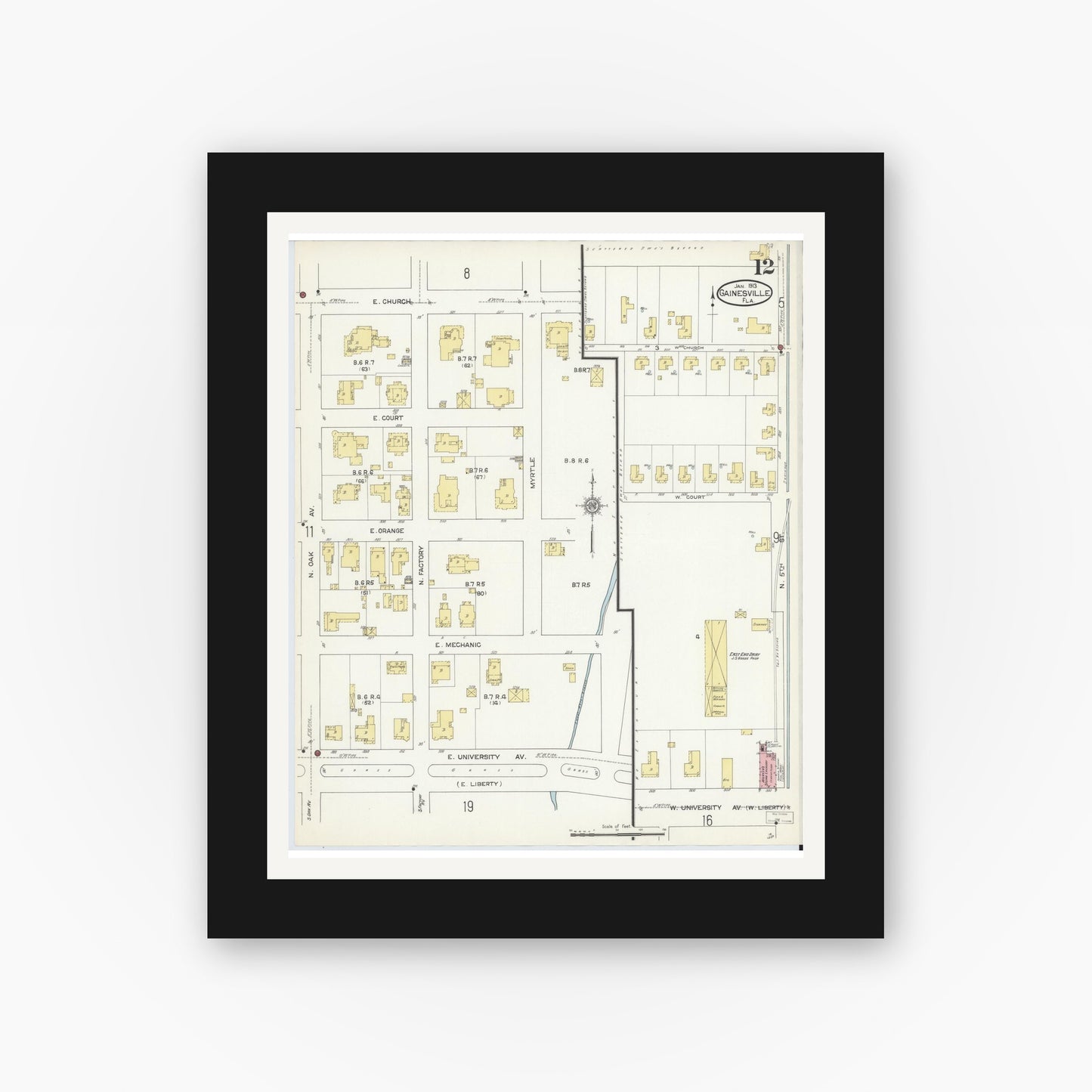 Old map wall art mockup — black gallery frame with white mat — Sanborn Fire Insurance Map from Gainesville, Alachua County, Florida (1913), Sheet #0012