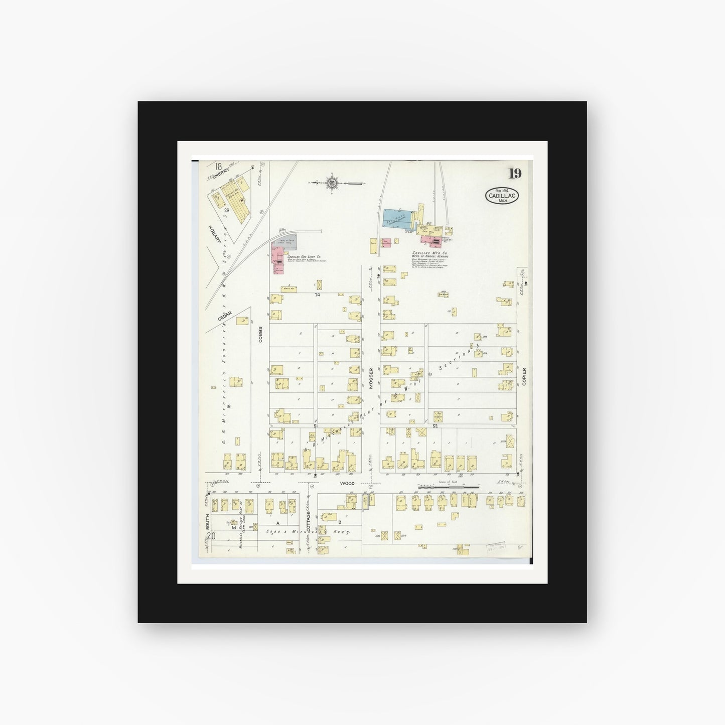 Old map wall art mockup — black gallery frame with white mat — Sanborn Fire Insurance Map from Cadillac, Wexford County, Michigan (1914), Sheet #0019