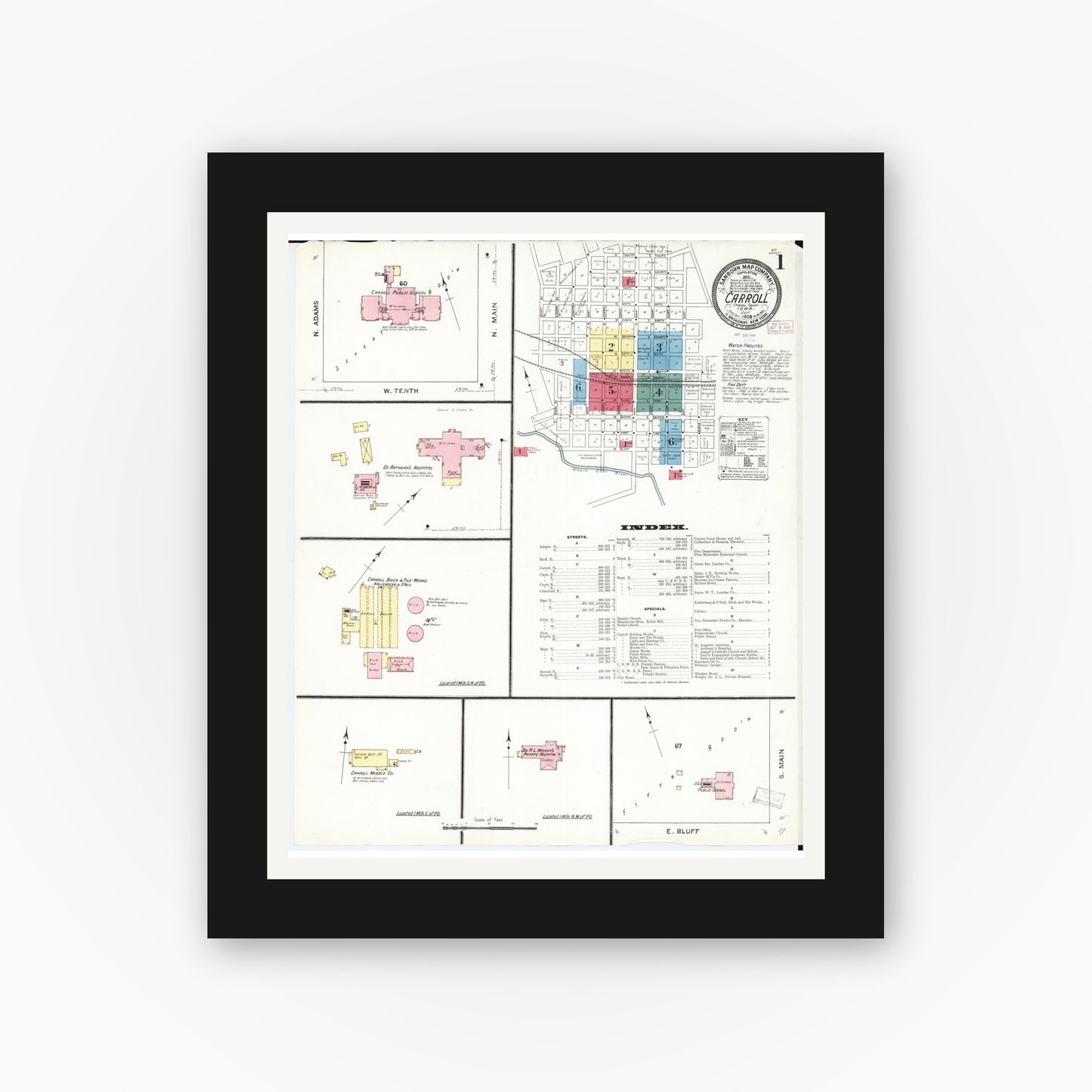 Old map wall art mockup — black gallery frame with white mat — Sanborn Fire Insurance Map from Carroll, Carroll County, Iowa (1909) — Complete Set