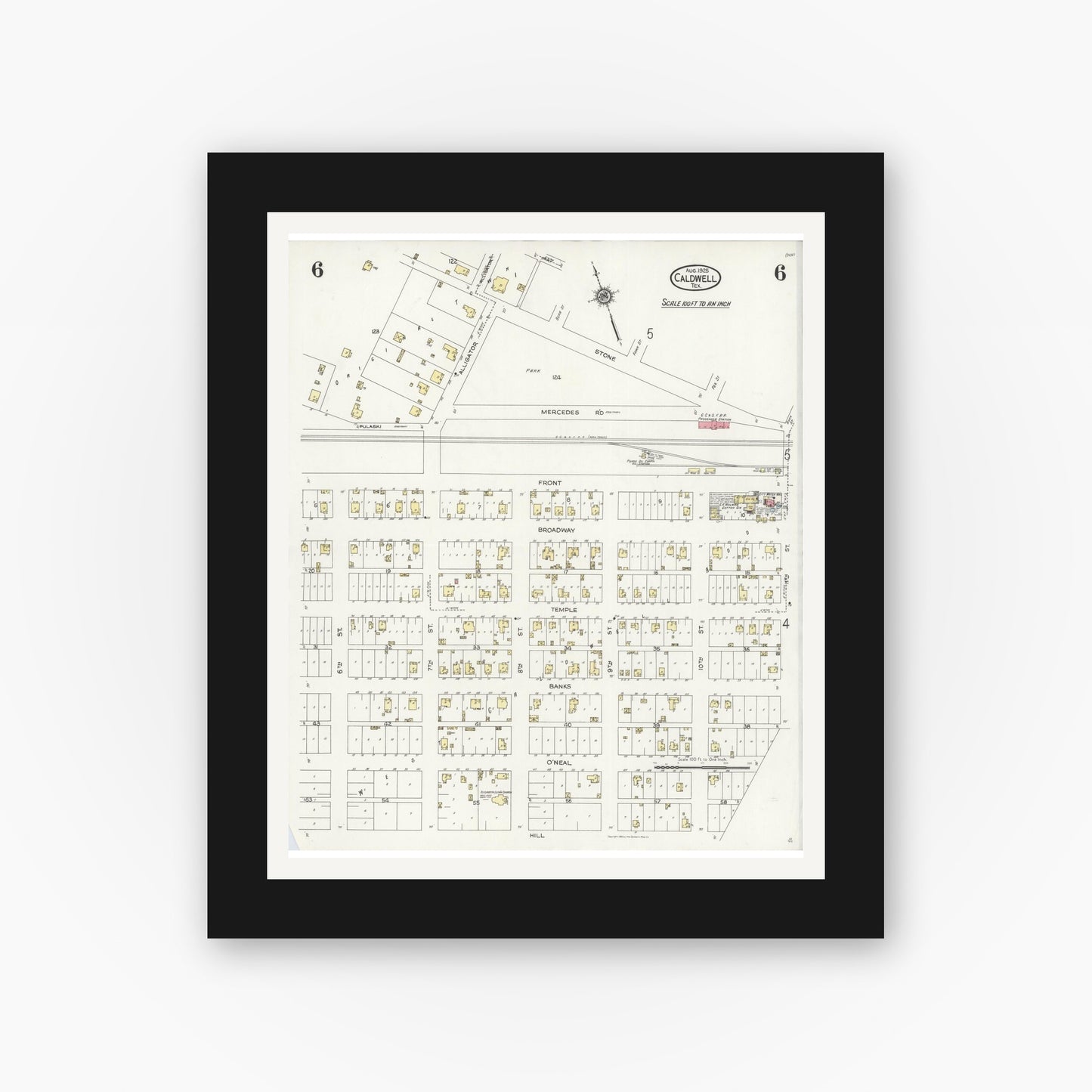 Old map wall art mockup — black gallery frame with white mat — Sanborn Fire Insurance Map from Caldwell, Burleson County, Texas (1925), Sheet #0006