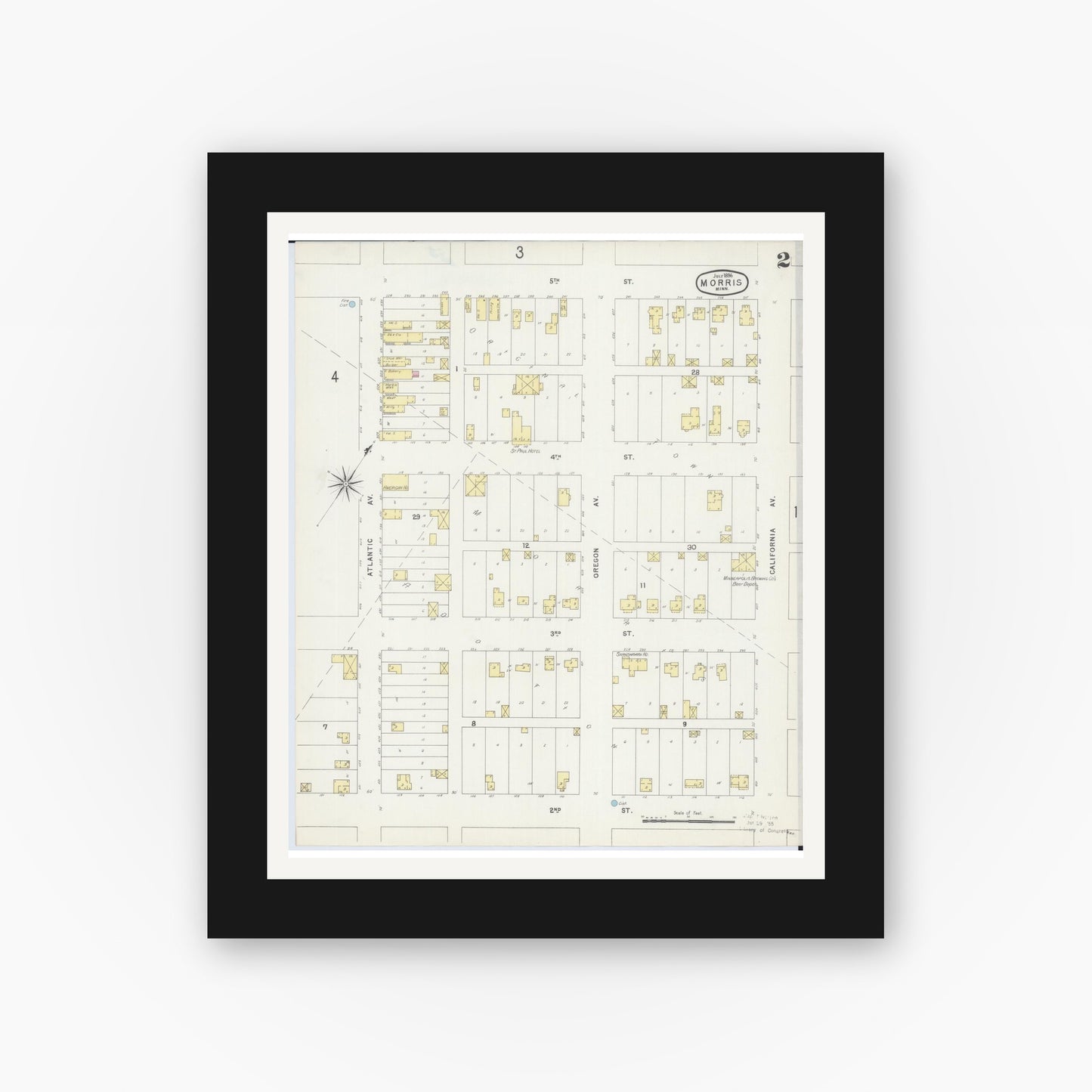 Old map wall art mockup — black gallery frame with white mat — Sanborn Fire Insurance Map from Morris, Stevens County, Minnesota (1896), Sheet #0002