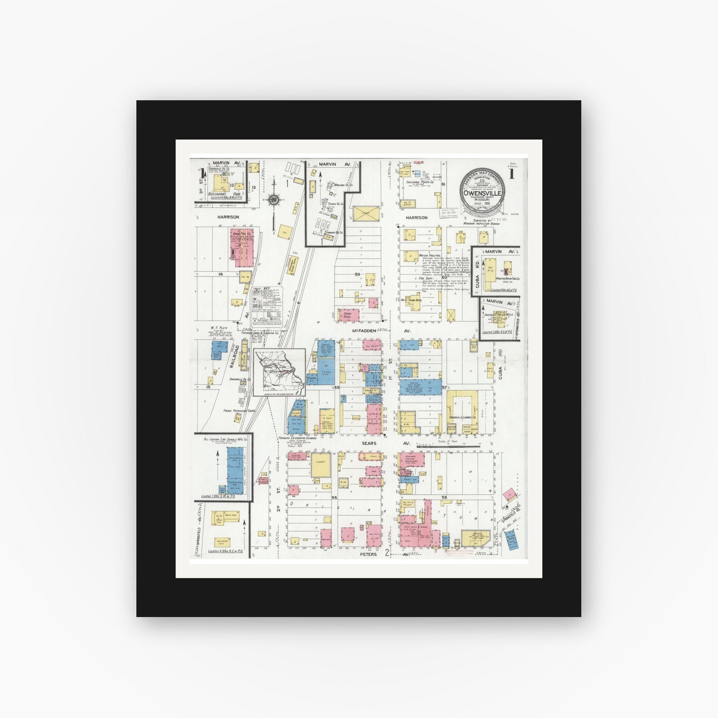 Old map wall art mockup — black gallery frame with white mat — Sanborn Fire Insurance Map from Owensville, Gasconade County, Missouri (1929) - Complete Map Set