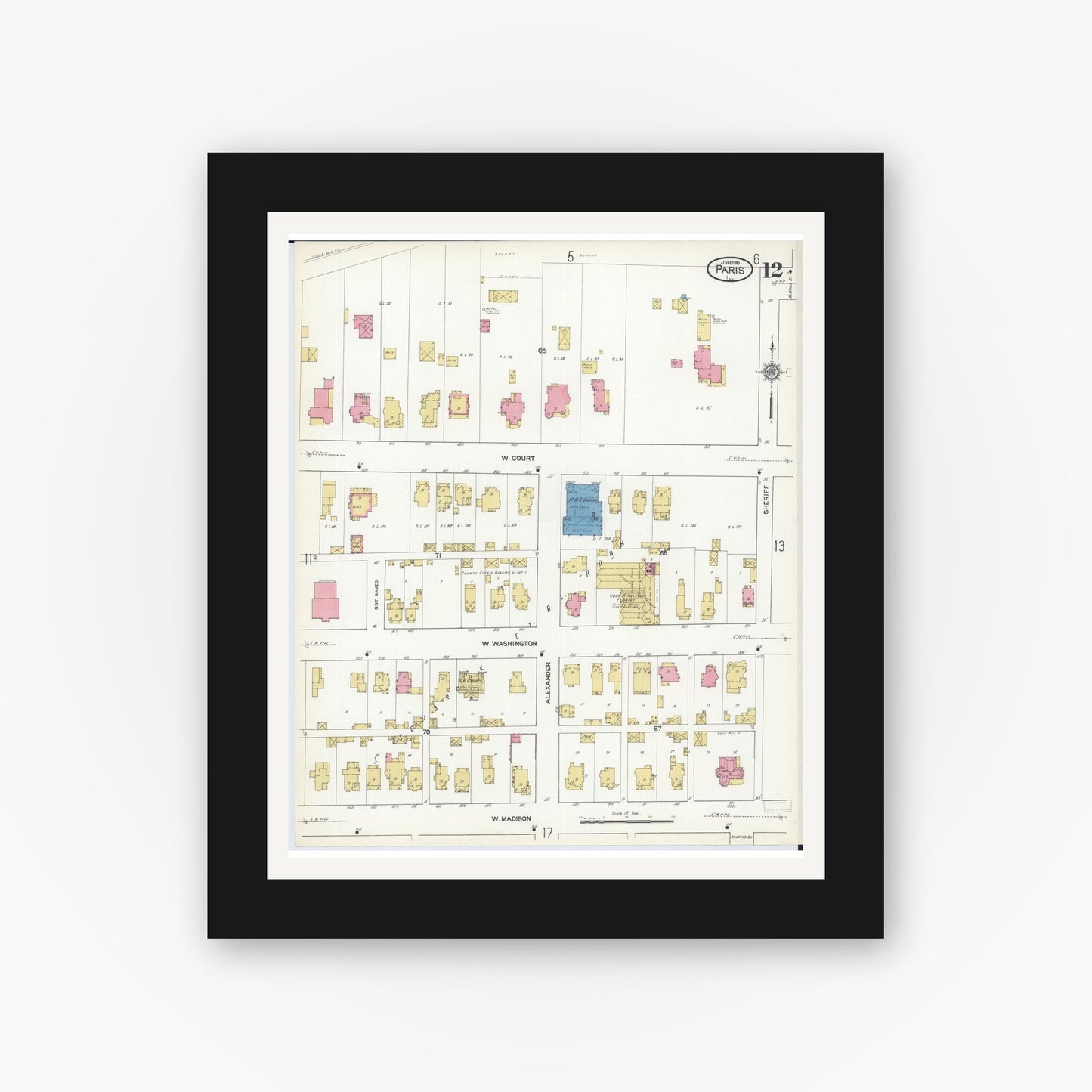 Old map wall art mockup — black gallery frame with white mat — Sanborn Fire Insurance Map from Paris, Edgar County, Illinois (1916), Sheet #0012