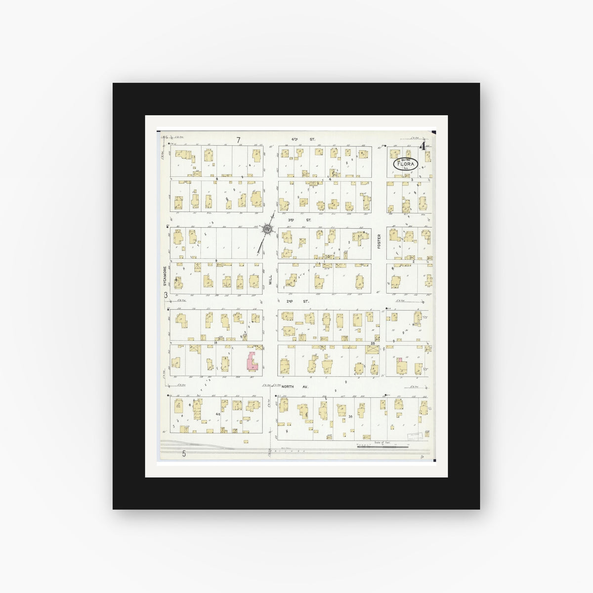 Old map wall art mockup — black gallery frame with white mat — Sanborn Fire Insurance Map from Flora, Clay County, Illinois (1912), Sheet #0004