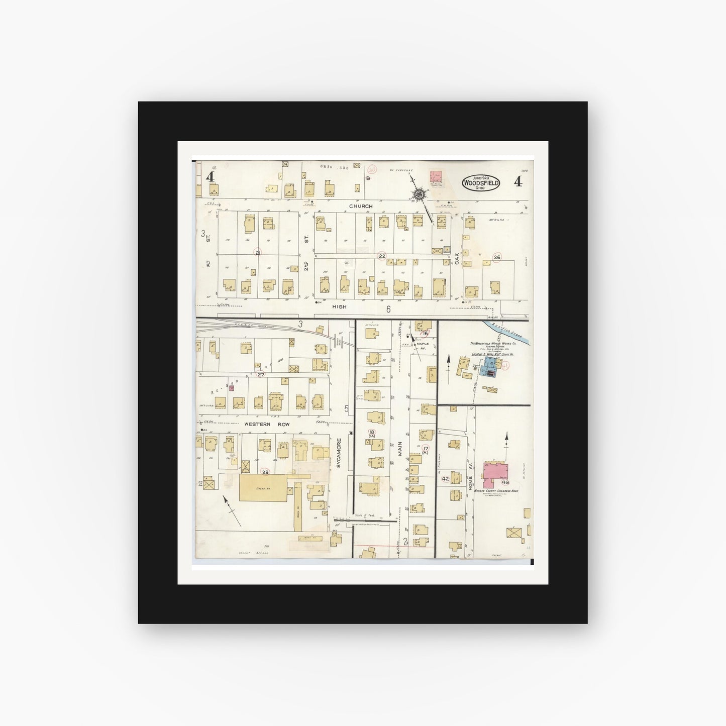 Old map wall art mockup — black gallery frame with white mat — Sanborn Fire Insurance Map from Woodsfield, Monroe County, Ohio (1949), Sheet #0004