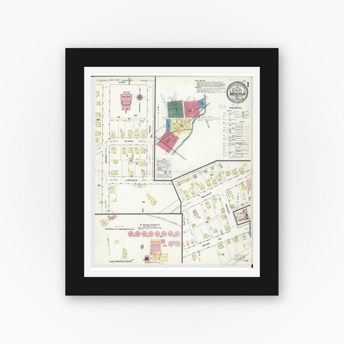 Old map wall art mockup — black gallery frame with white mat — Sanborn Fire Insurance Map from Minerva, Stark And Carroll Counties, Ohio (1909), Sheet #0001