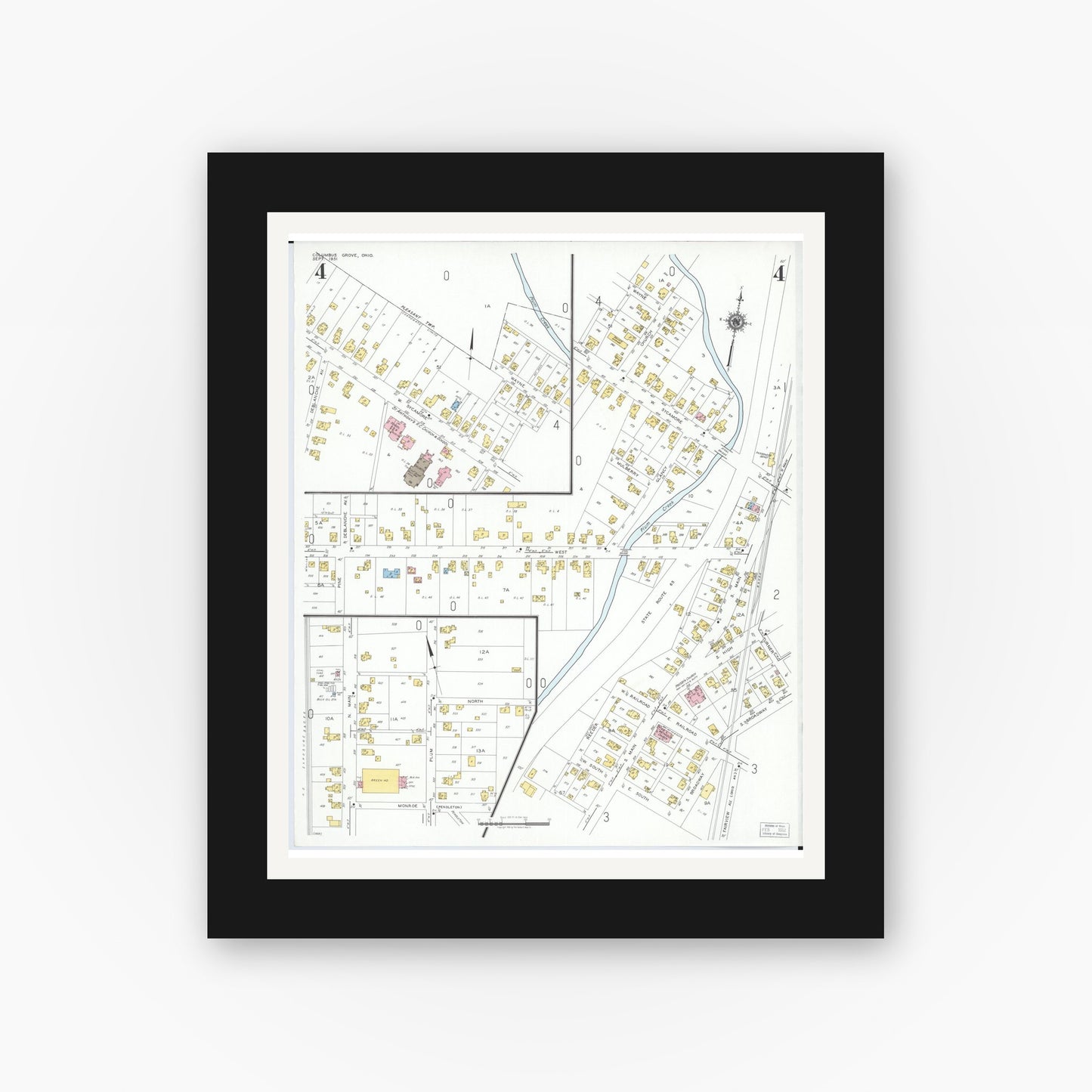 Old map wall art mockup — black gallery frame with white mat — Sanborn Fire Insurance Map from Columbus Grove, Putnam County, Ohio (1951), Sheet #0004