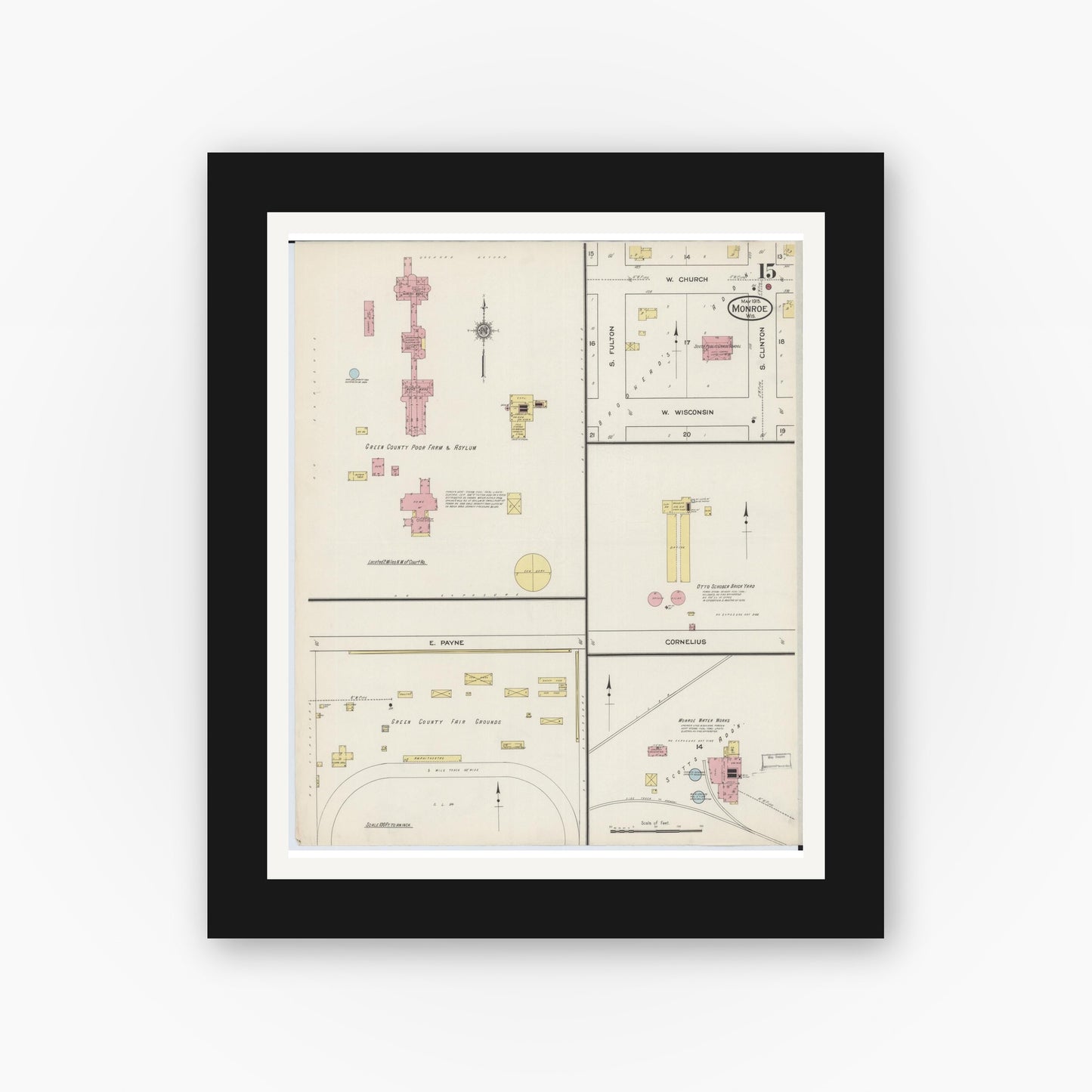 Old map wall art mockup — black gallery frame with white mat — Sanborn Fire Insurance Map from Monroe, Green County, Wisconsin (1915), Sheet #0015