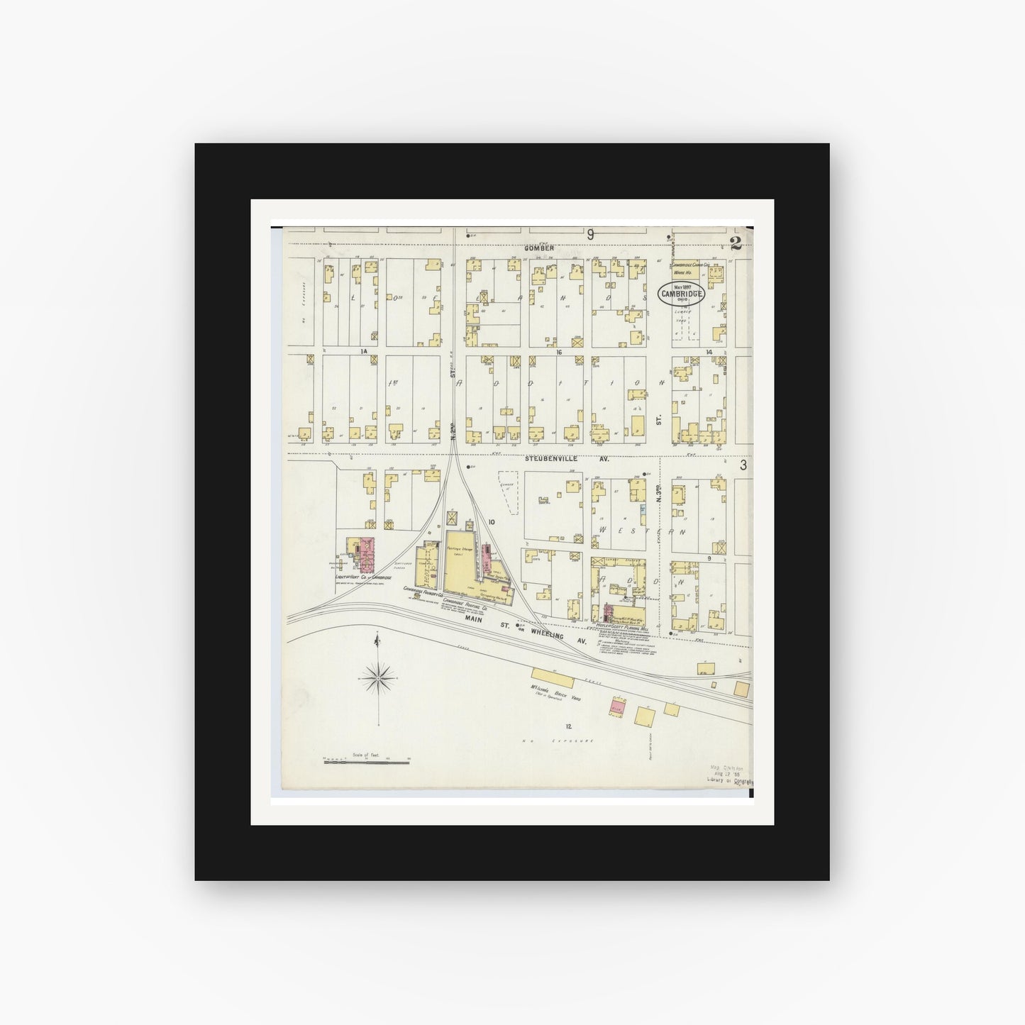 Old map wall art mockup — black gallery frame with white mat — Sanborn Fire Insurance Map from Cambridge, Guernsey County, Ohio (1897), Sheet #0002