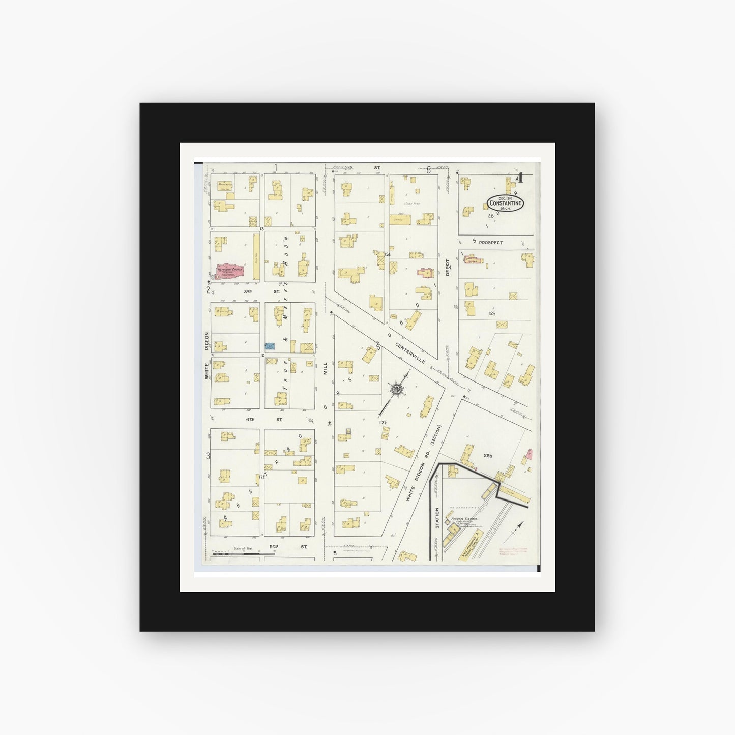 Old map wall art mockup — black gallery frame with white mat — Sanborn Fire Insurance Map from Constantine, Saint Joseph County, Michigan (1916), Sheet #0004