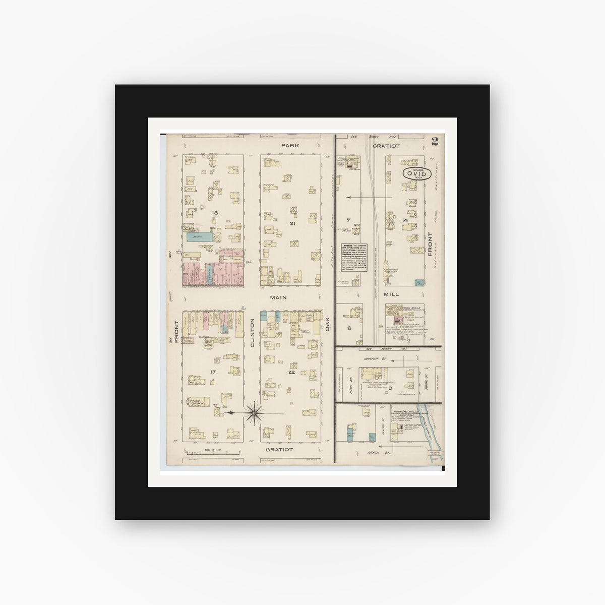 Old map wall art mockup — black gallery frame with white mat — Sanborn Fire Insurance Map from Ovid, Clinton County, Michigan (1884), Sheet #0002